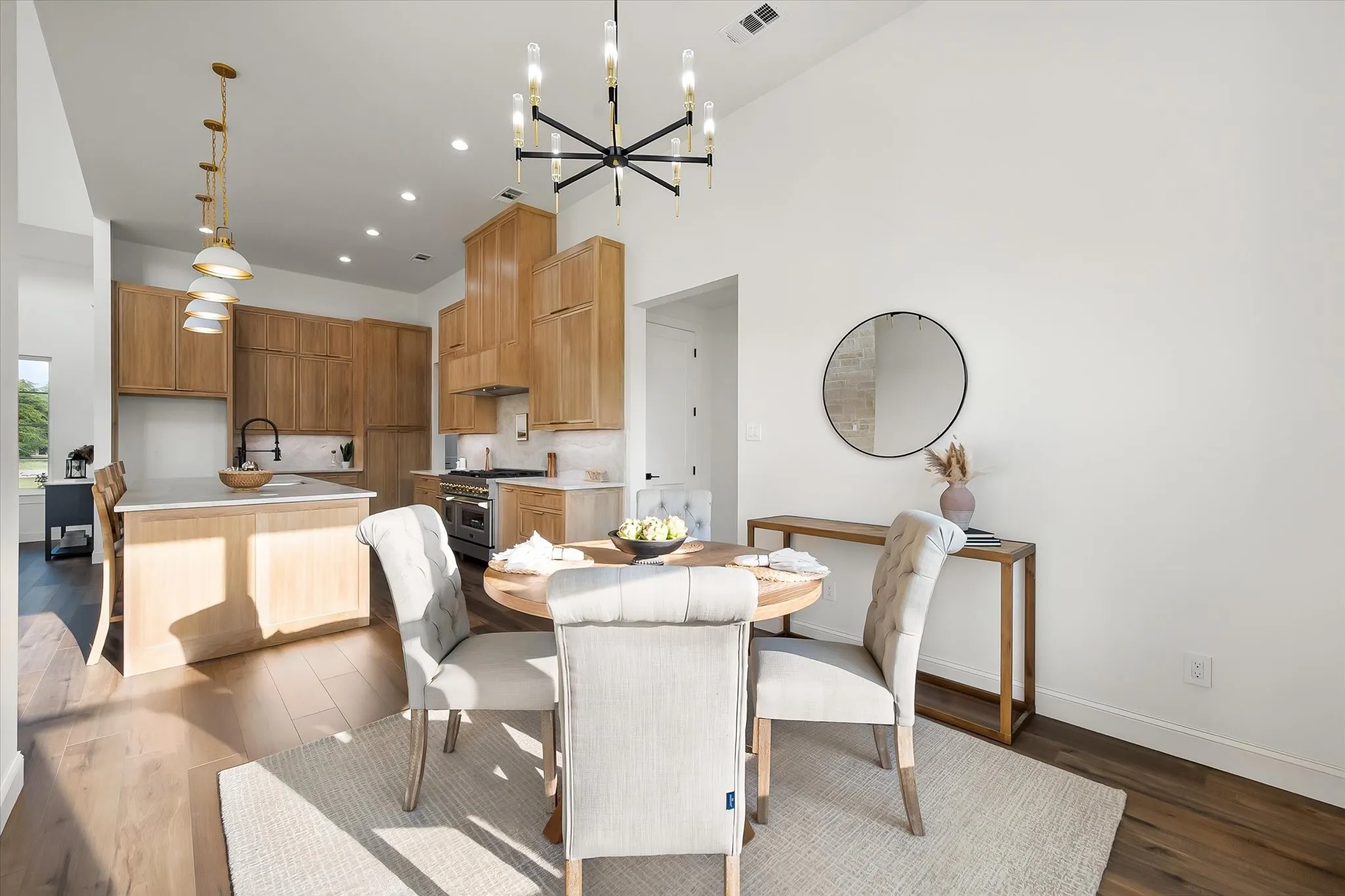 Kitchen and dining areas flow together beautifully for casual meals and entertaining.