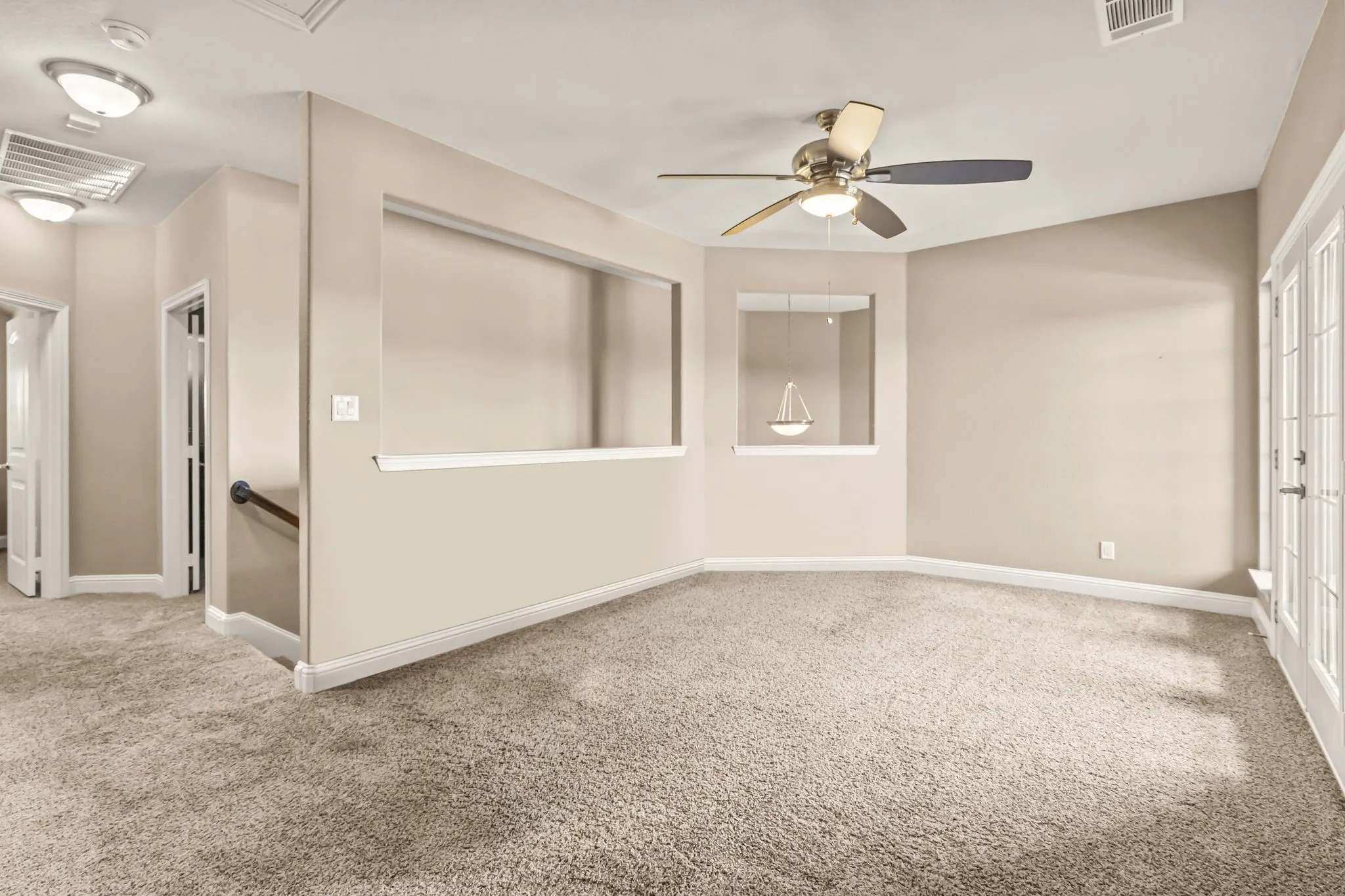 Loft game room / sitting area virtually enhanced to remove furniture