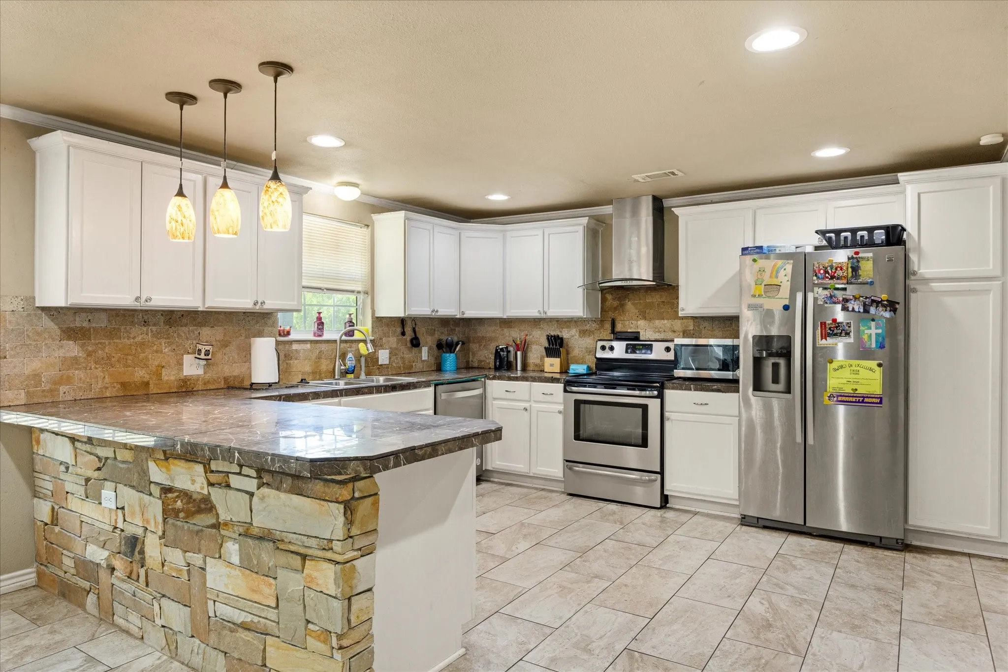 The kitchen offers plenty of storage.