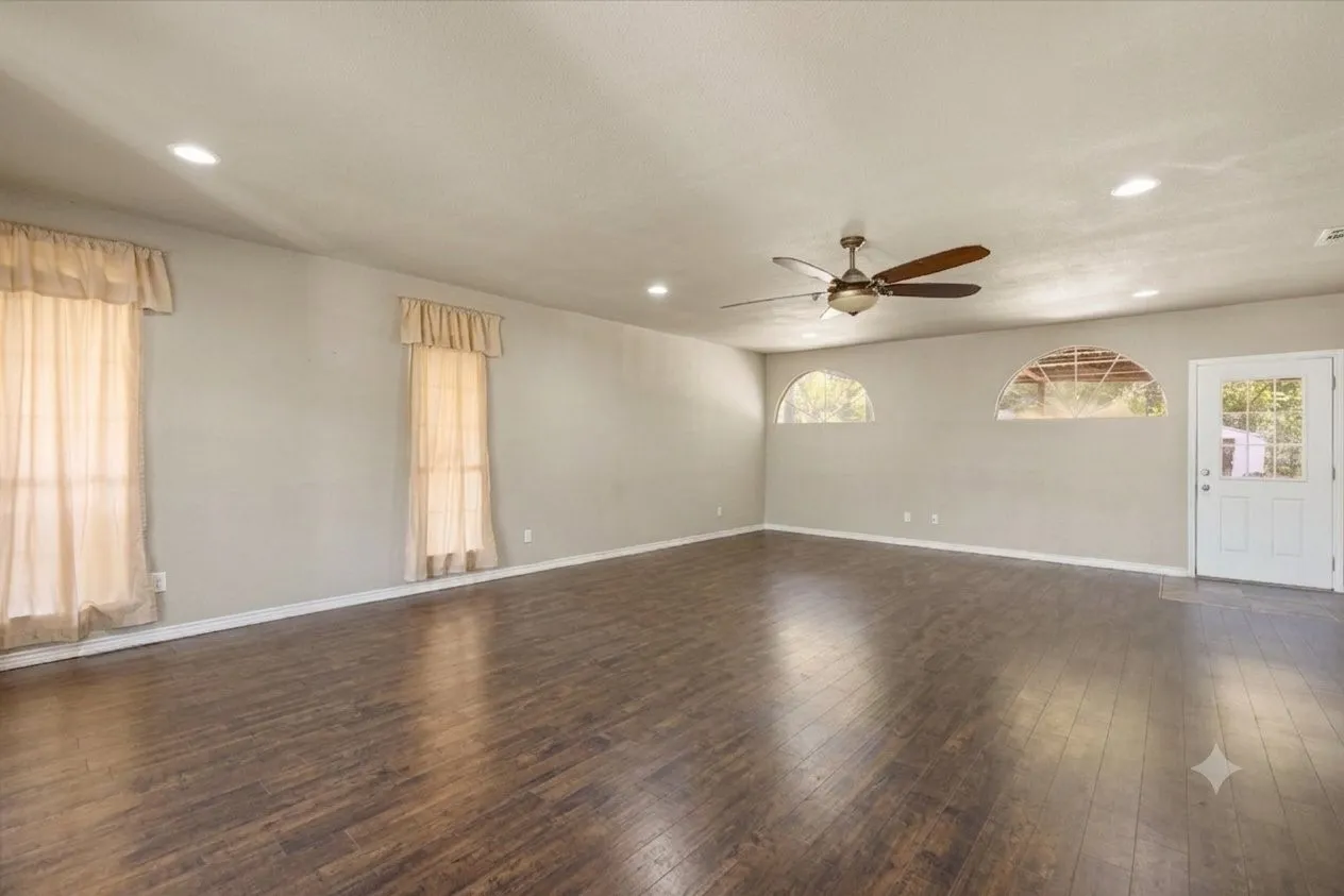 Photo digitally edited using AI to remove furniture/personal items. Property shown in as-is condition