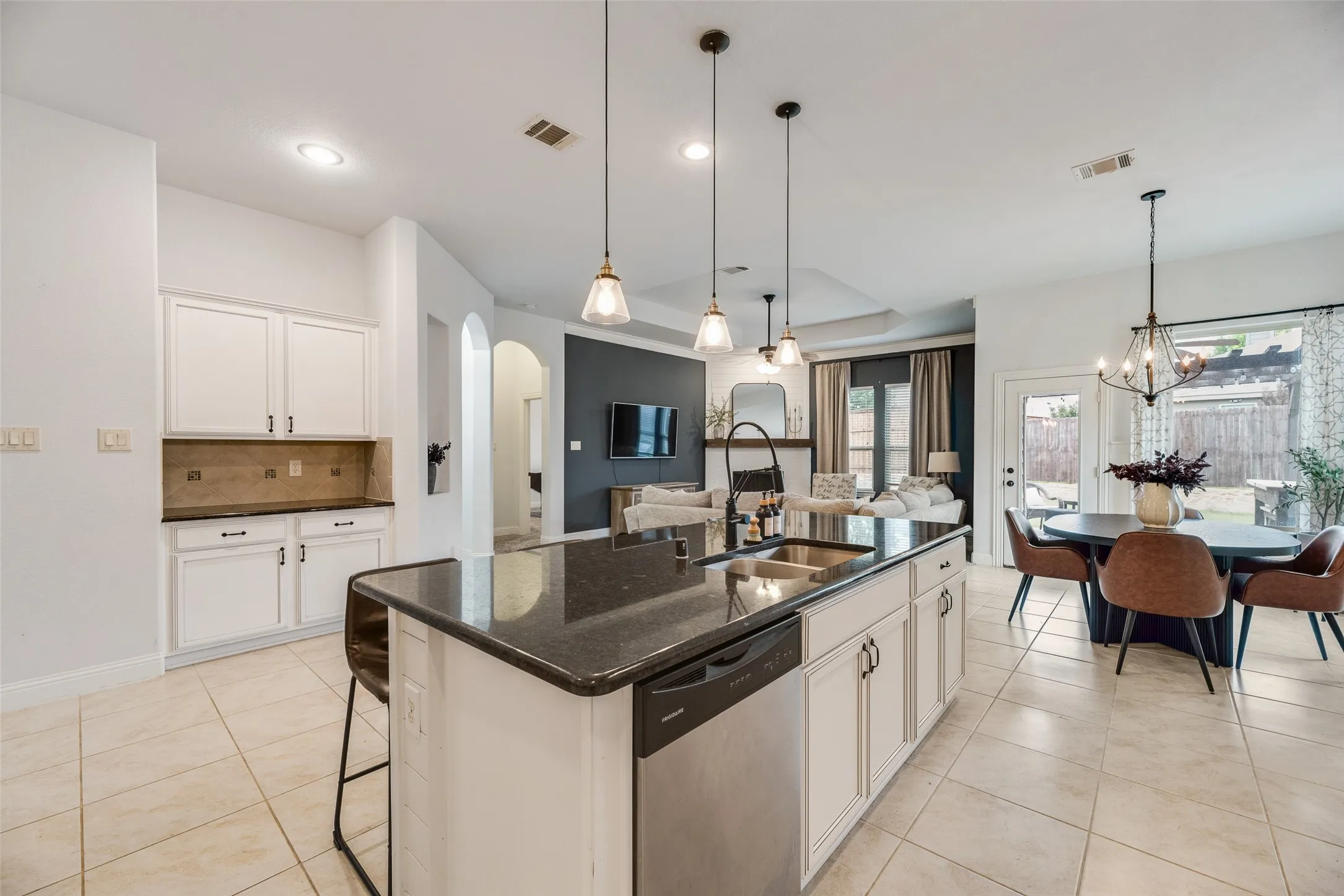 Kitchen features an island and coffee-bar area for entertaining guests or your day to day family lives