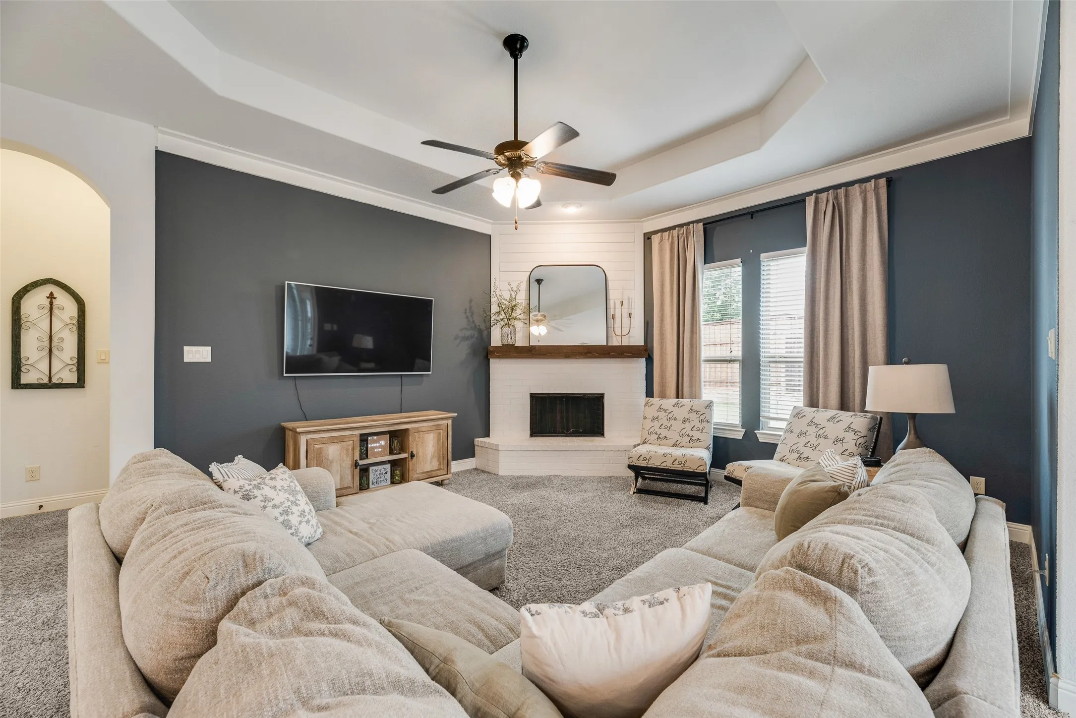 Wood burning fireplace takes center stage in this space