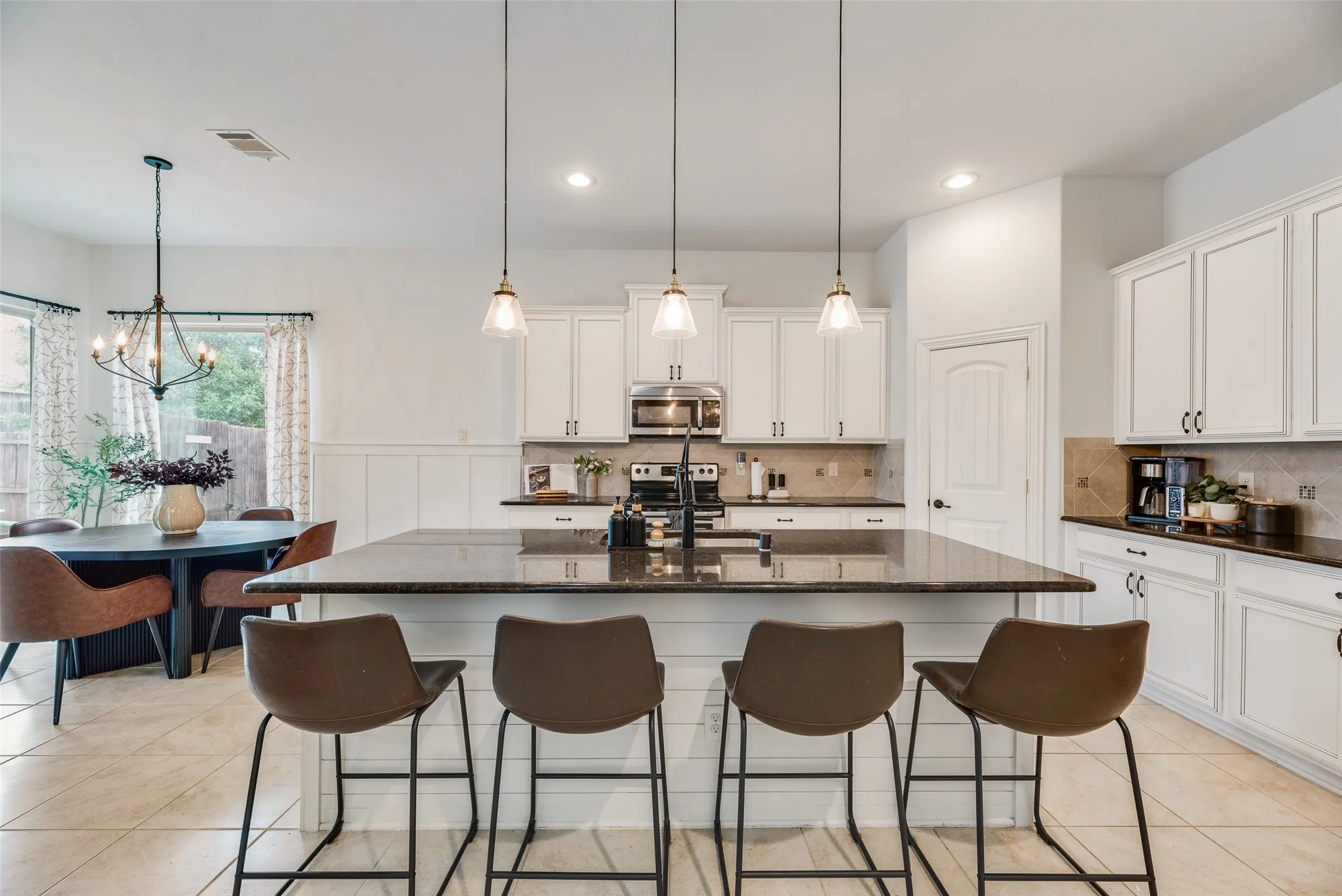 Granite countertops and kitchen island ready for your family