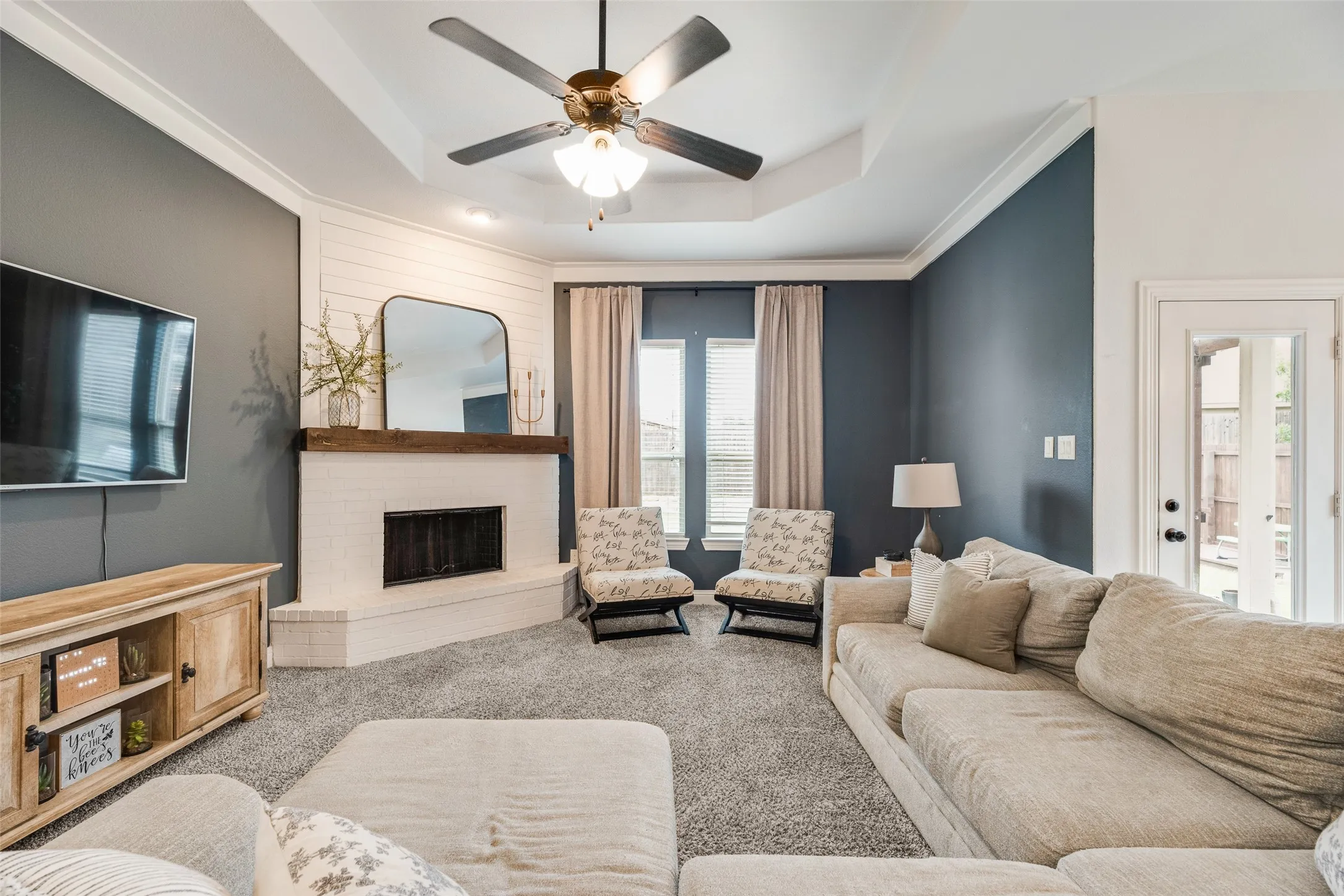 Can you imagine your family in this spacious living room area?