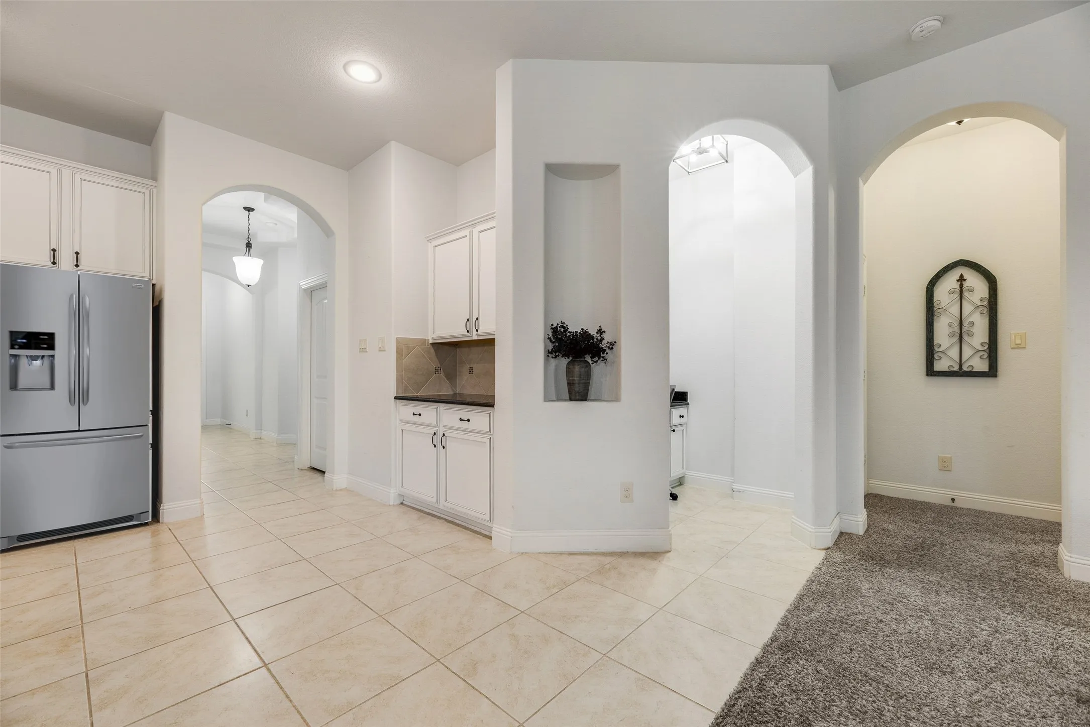 You can see where the heart of the home connects with kitchen, living and office space
