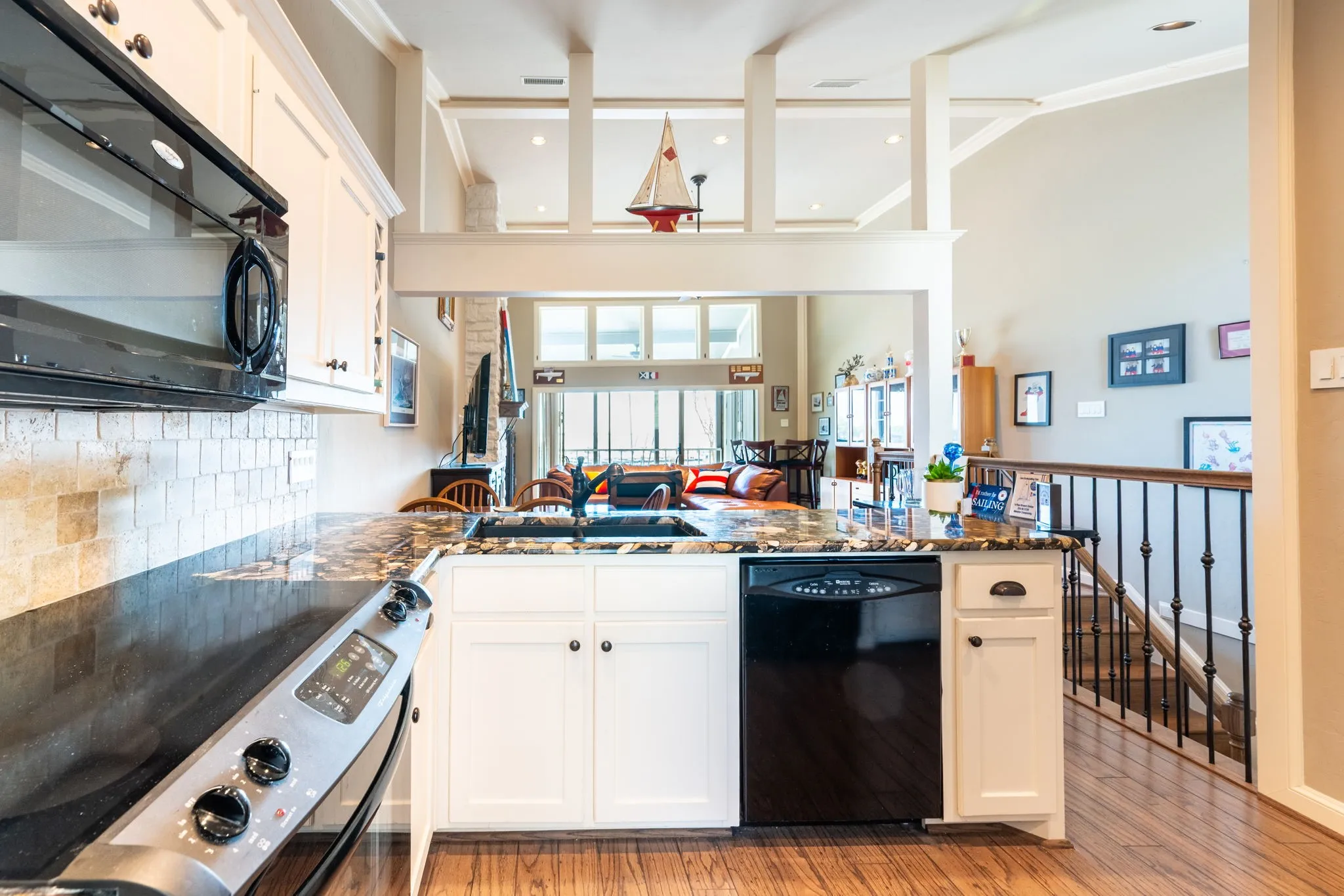 Open concept kitchen, dining and living room.