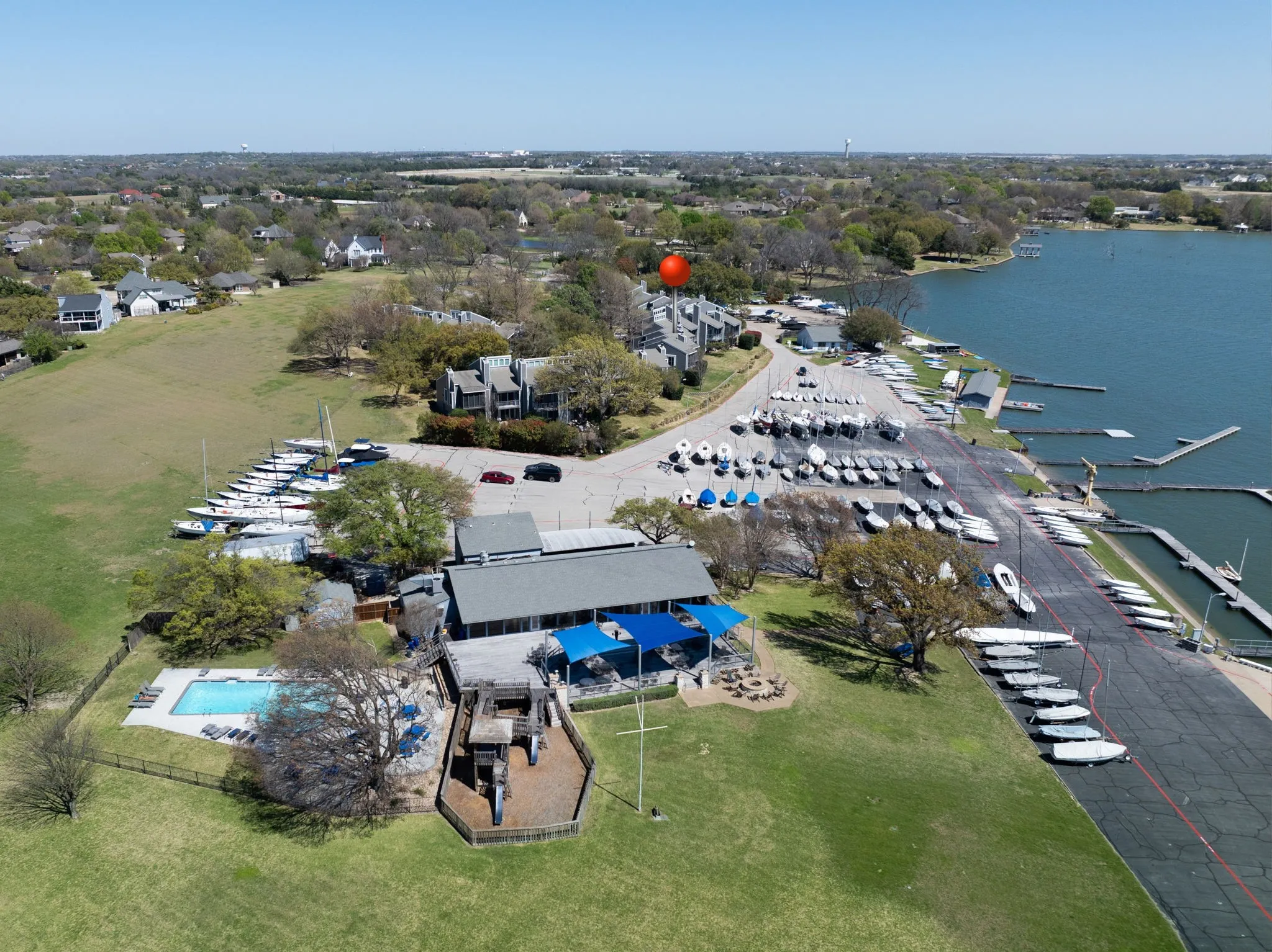 Waterfront property featuring extensive boat storage, multiple docks, and direct water access