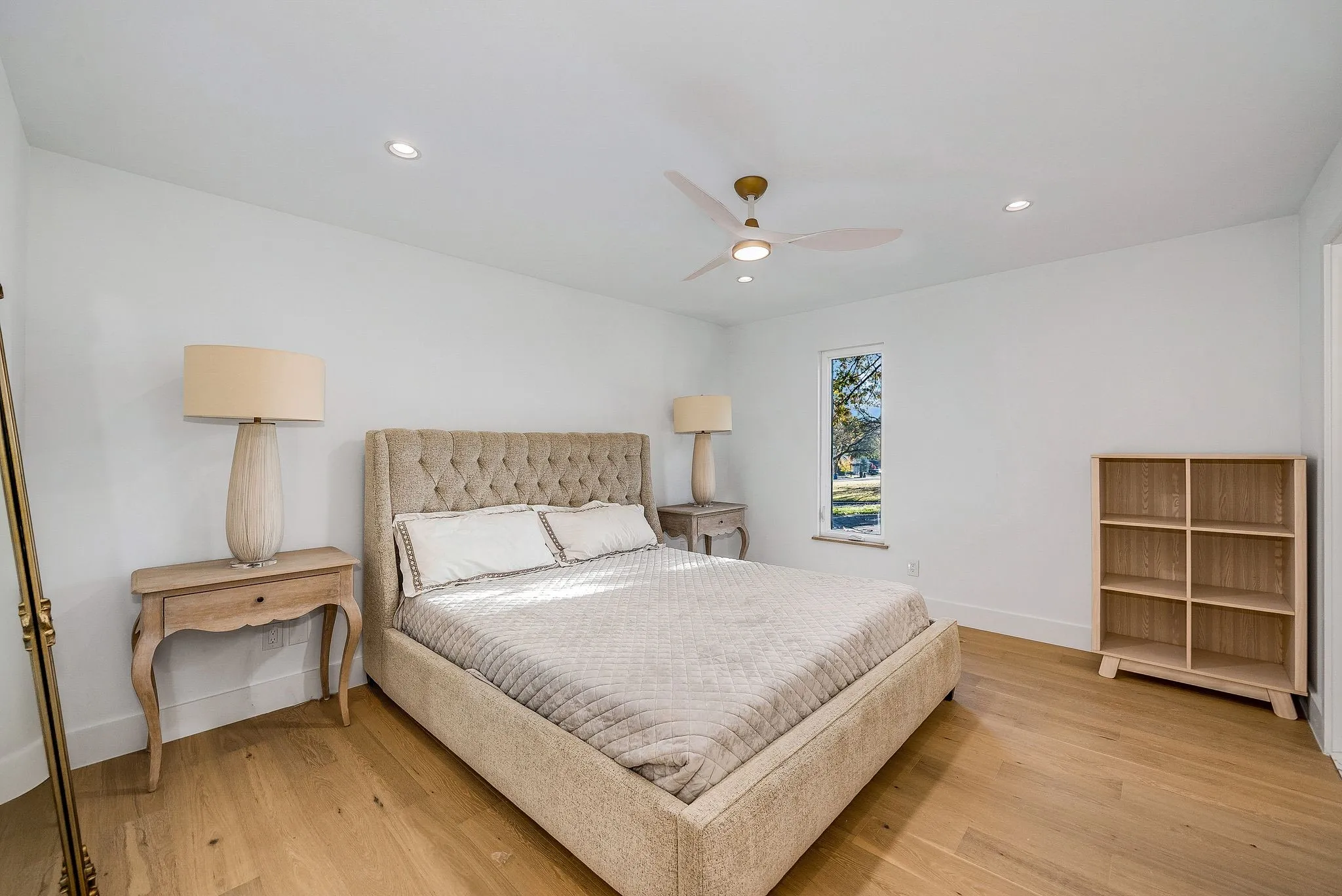 Bedroom featuring ceiling fan, light wood-style flooring, and recessed lighting