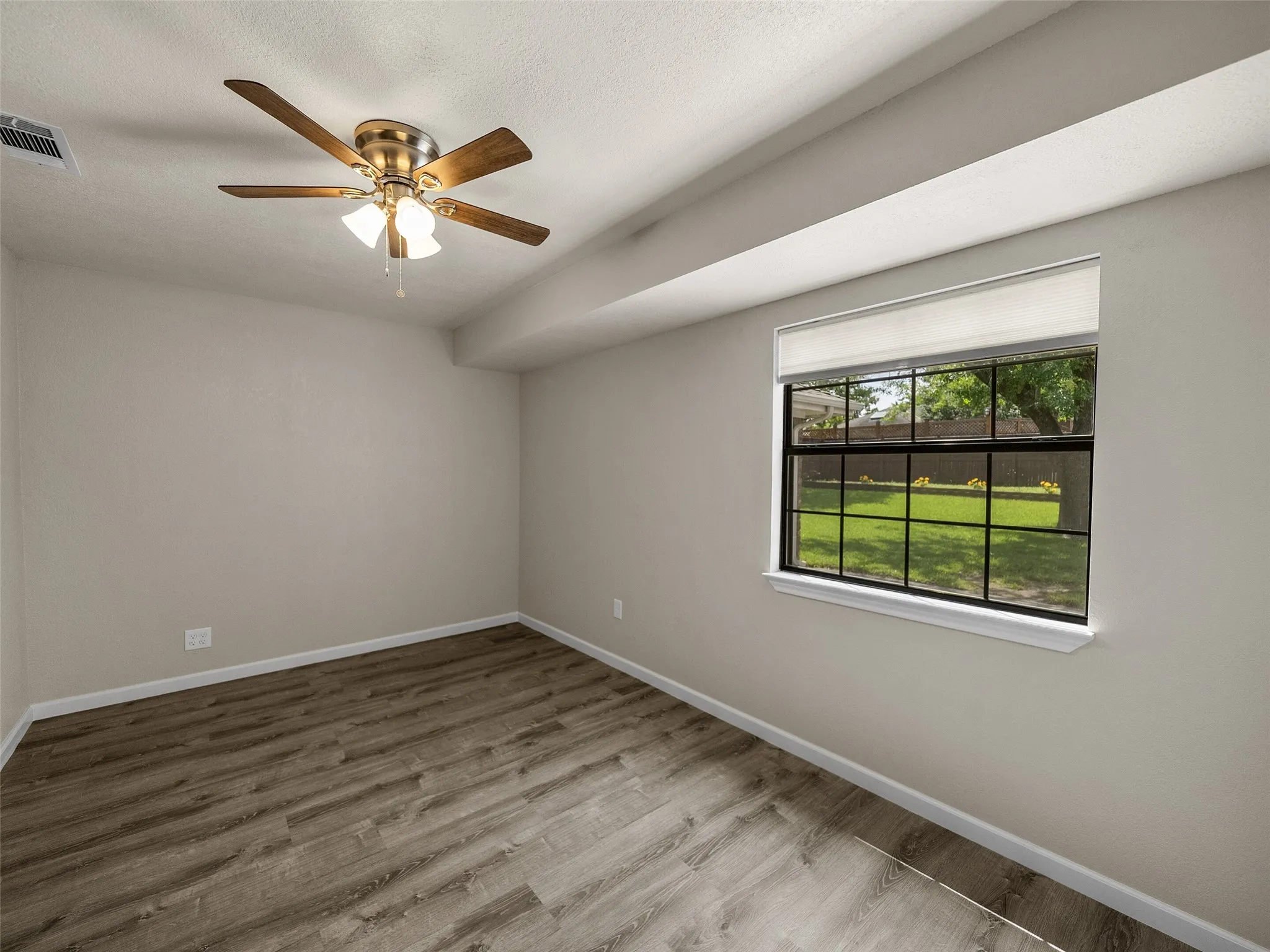 The flex area overlooking the backyard can be used as a fourth bedroom as it has a closet (small with built-in drawers) or flex space such as an office with a pull-out sofa-bed.