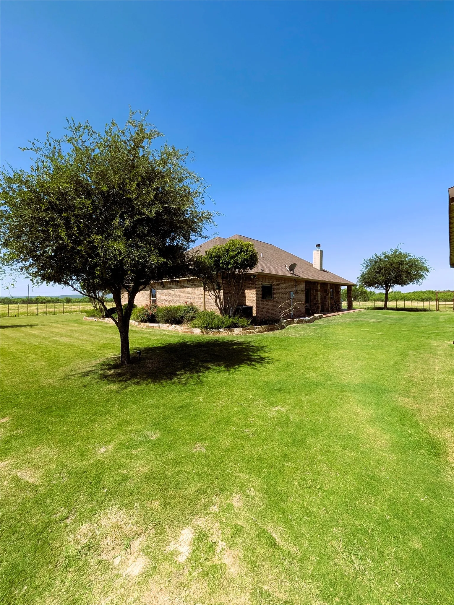 Side of home and yard