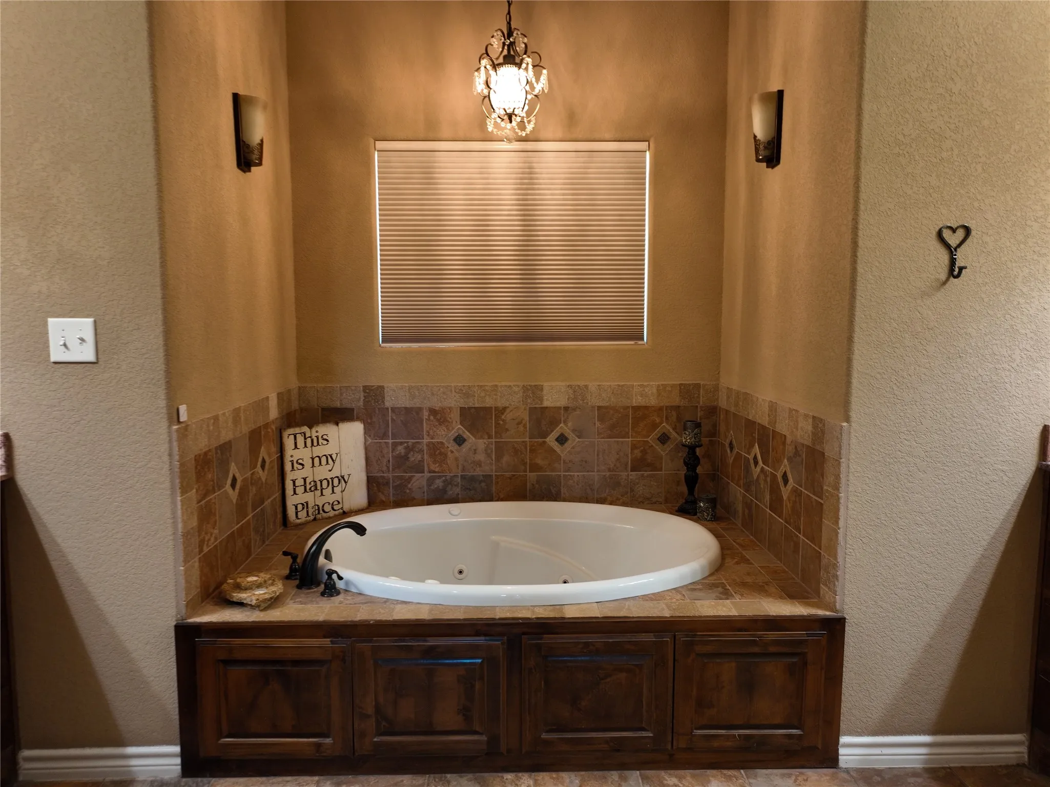 Jacuzzi Tub with battery operated shade that opens up for a beautiful view of the backyard and acreage