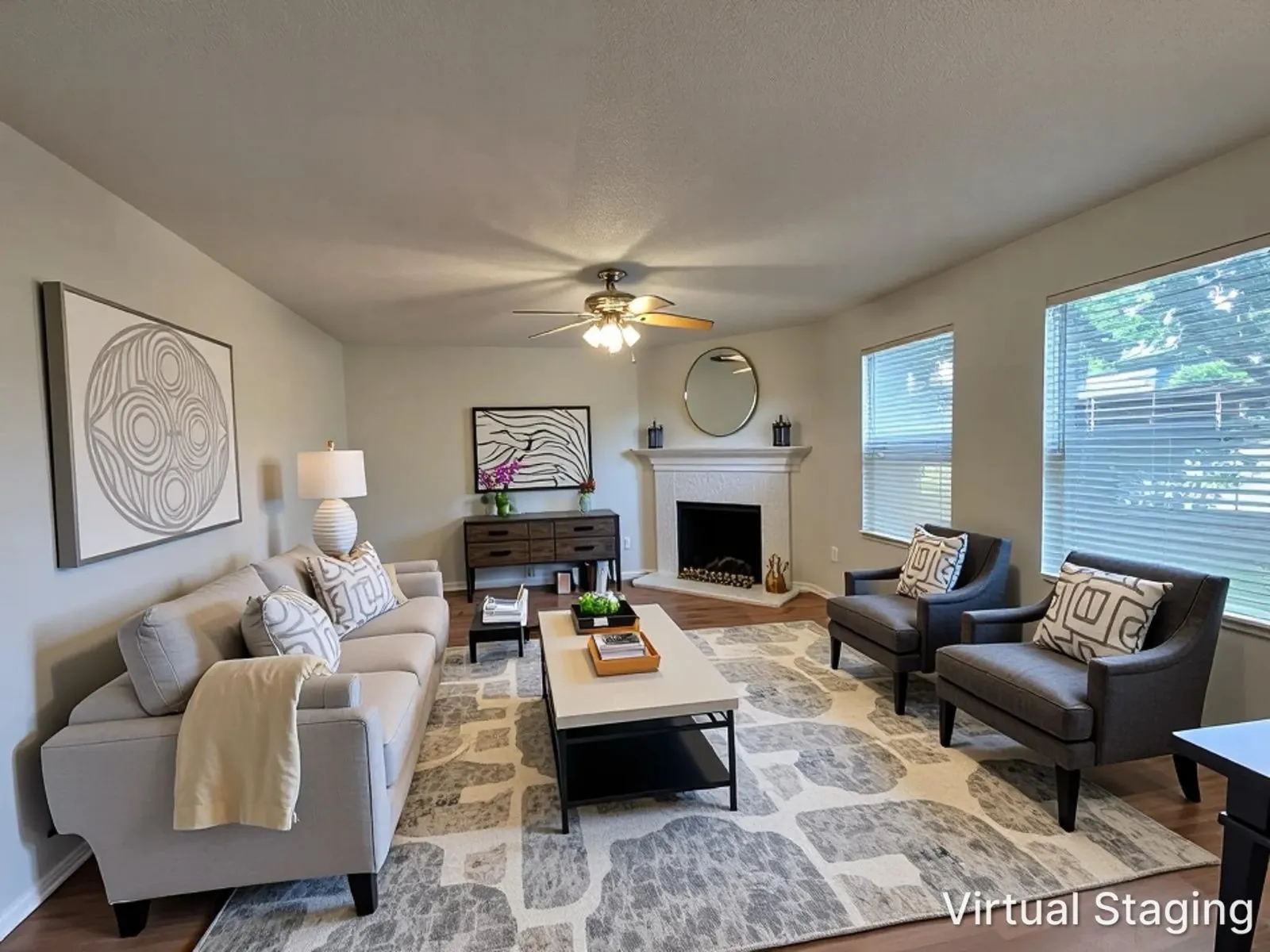 Living room featuring wood-finish flooring, a white mantel fireplace, dual windows with blinds, a ceiling fan with integrated lighting, and light-toned wall paint