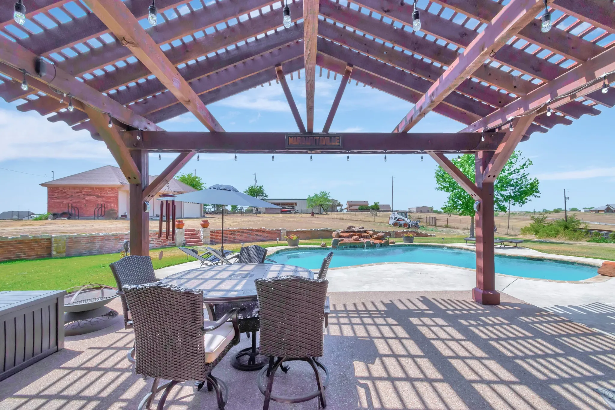 View of patio with a pergola