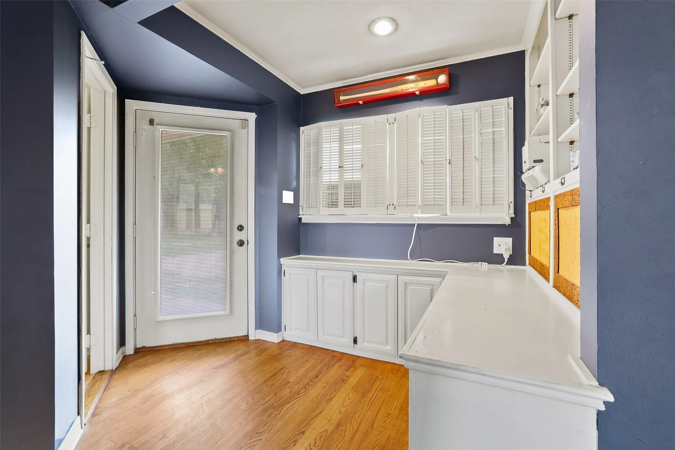 Secondary bedroom door leads out to entertaining deck
