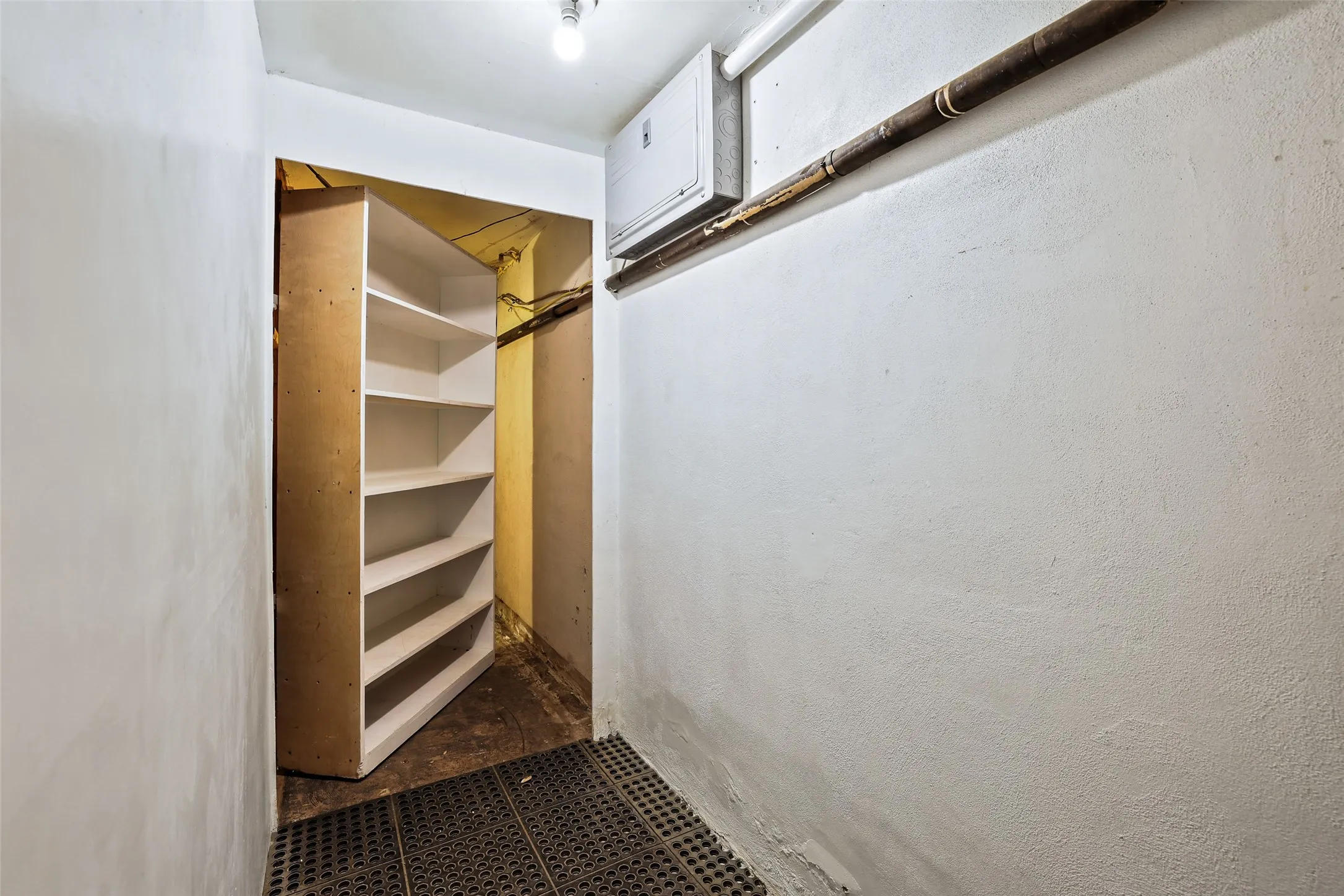 Secret passageway offers hidden storage behind bookcase (1 of 2 in home)