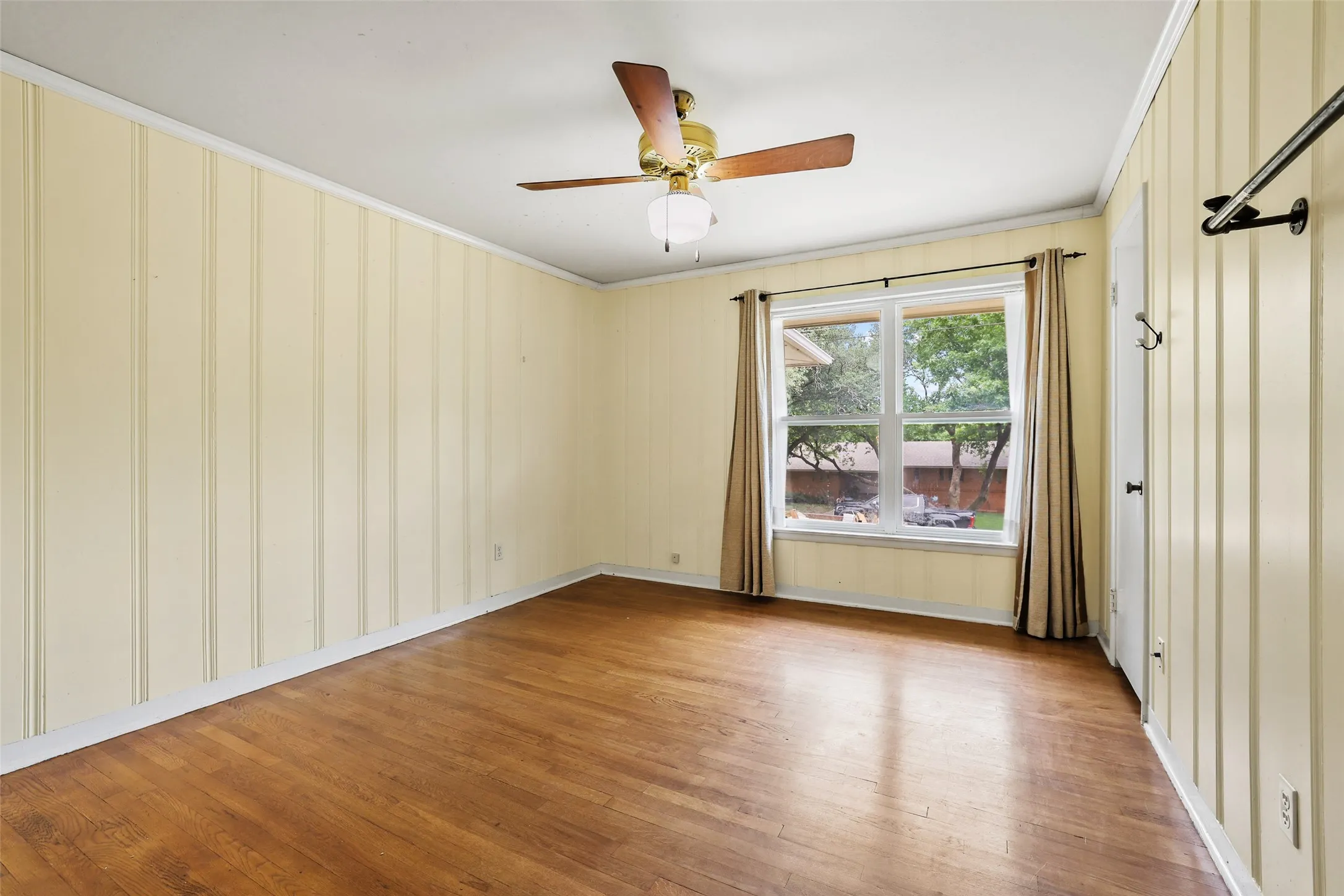 Original paneling in secondary bedroom