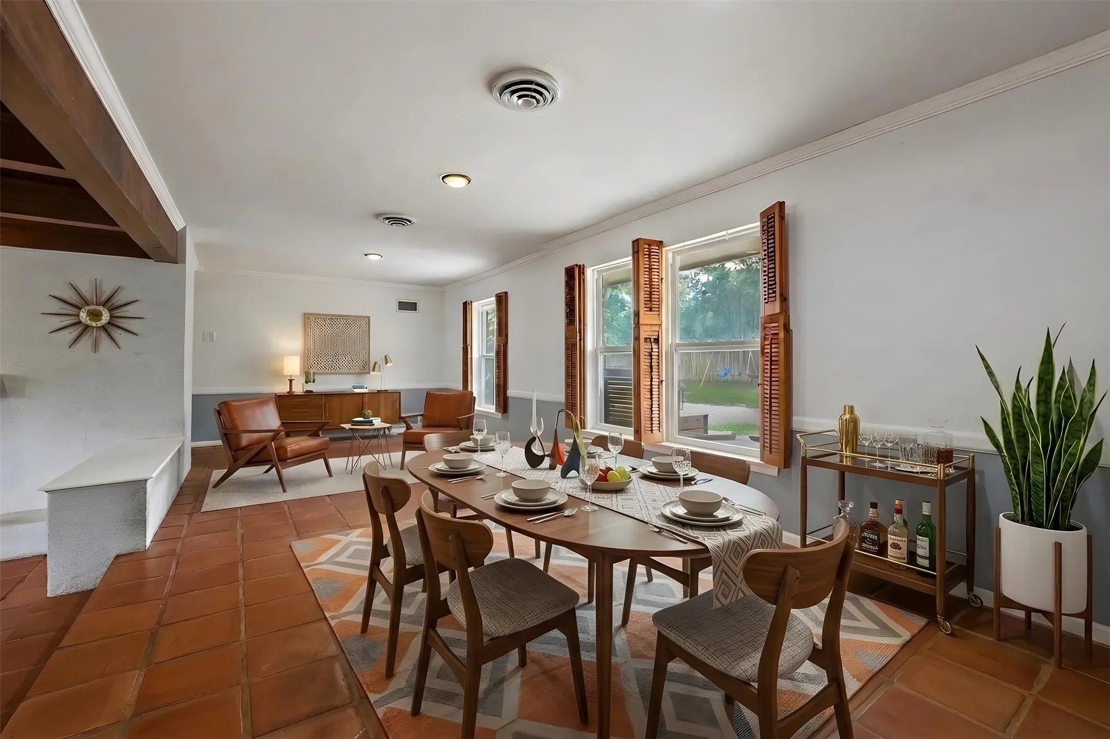 Virtually staged dining area and additional living area
