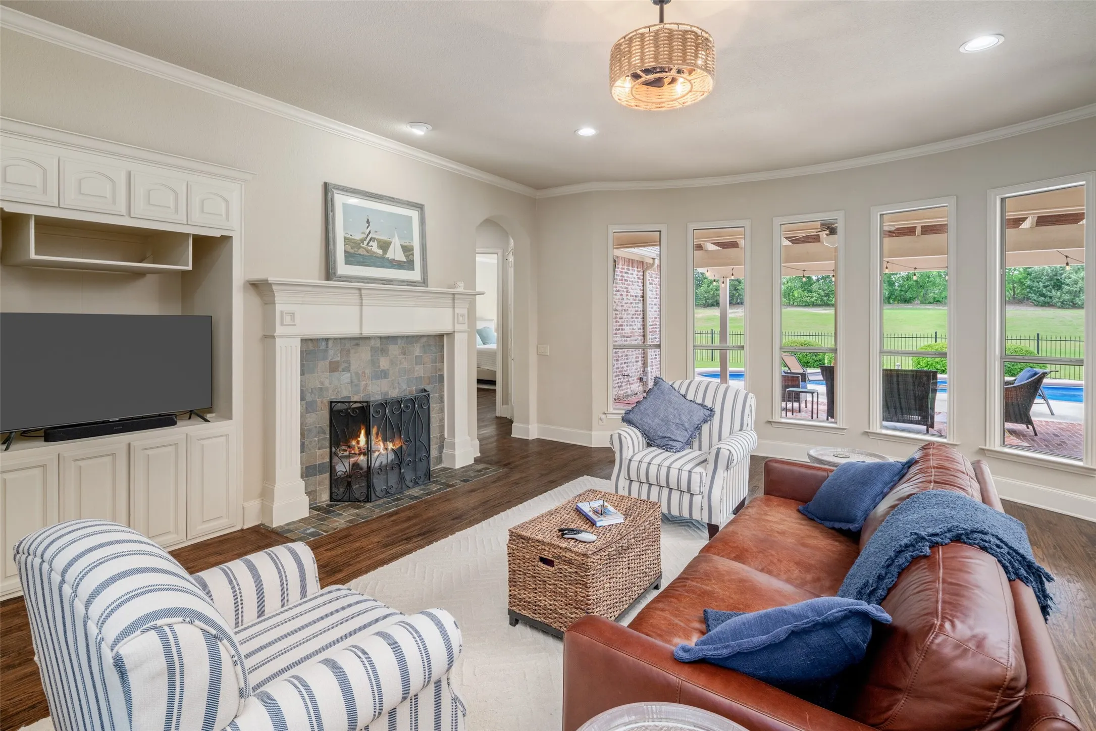 Spacious Living Room with Tall Floor to Ceiling Windows, Extended Wood Floors