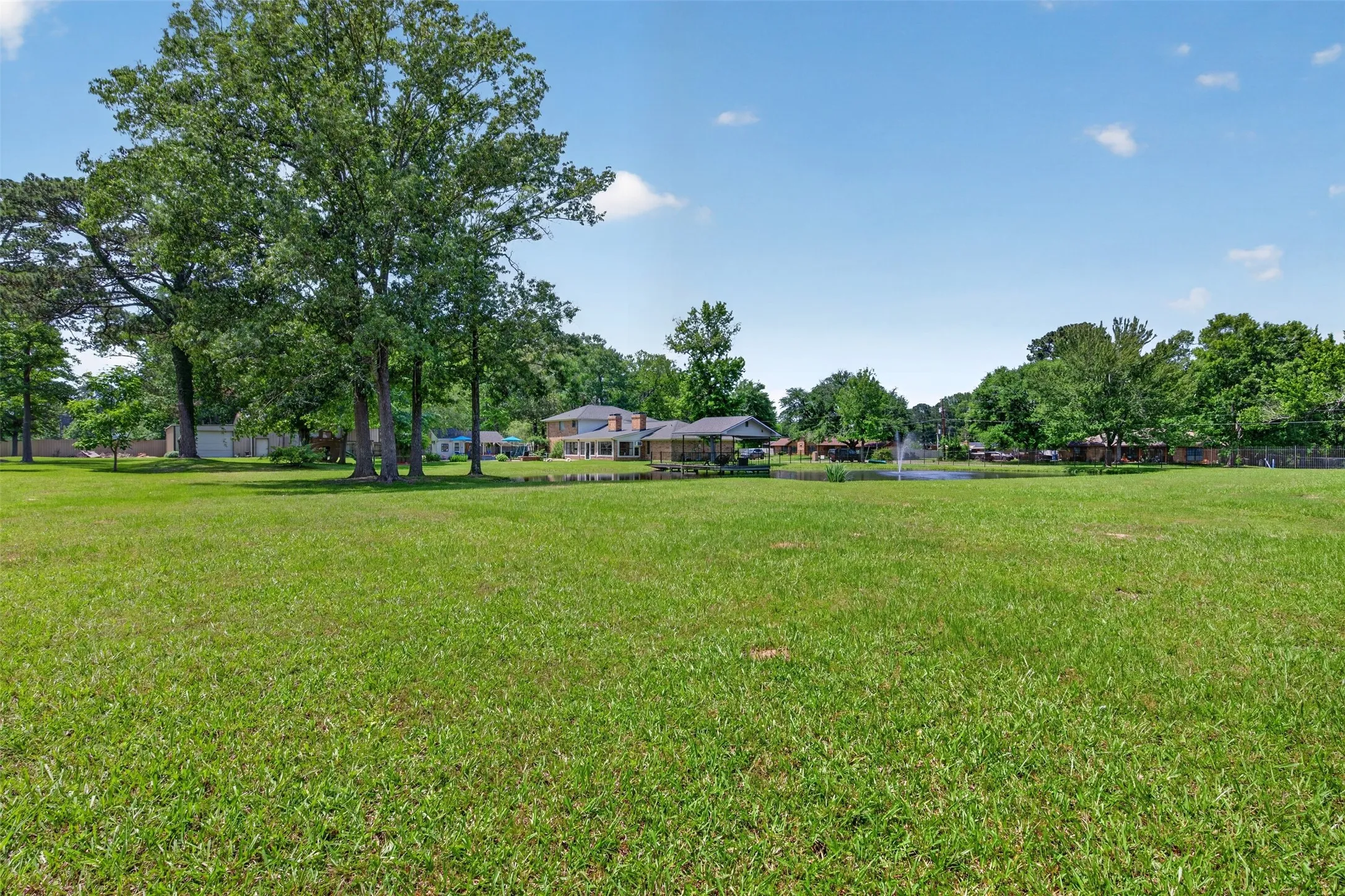 Expansive green lawn providing abundant open space