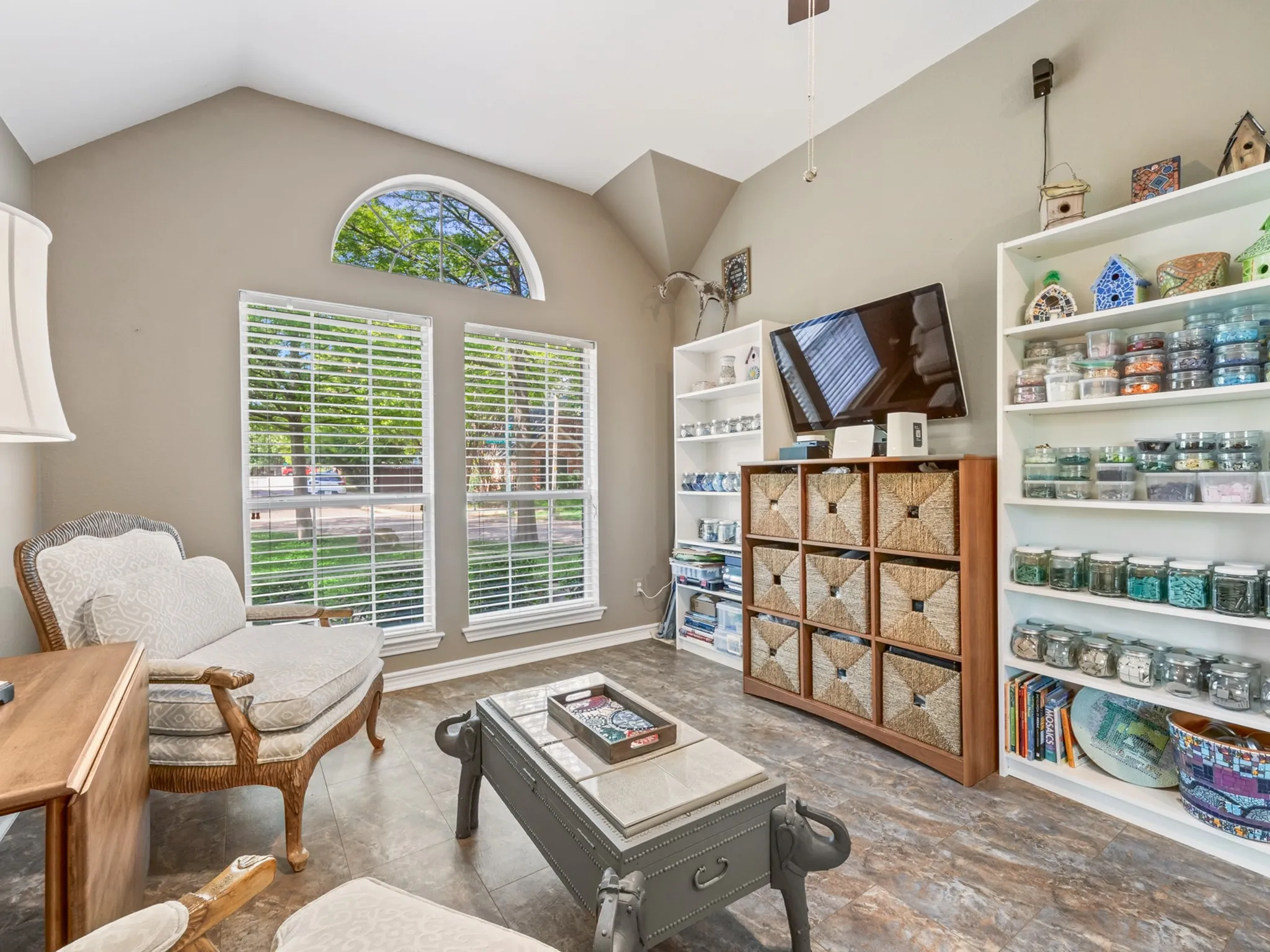 Vaulted ceiling with an arched transom window