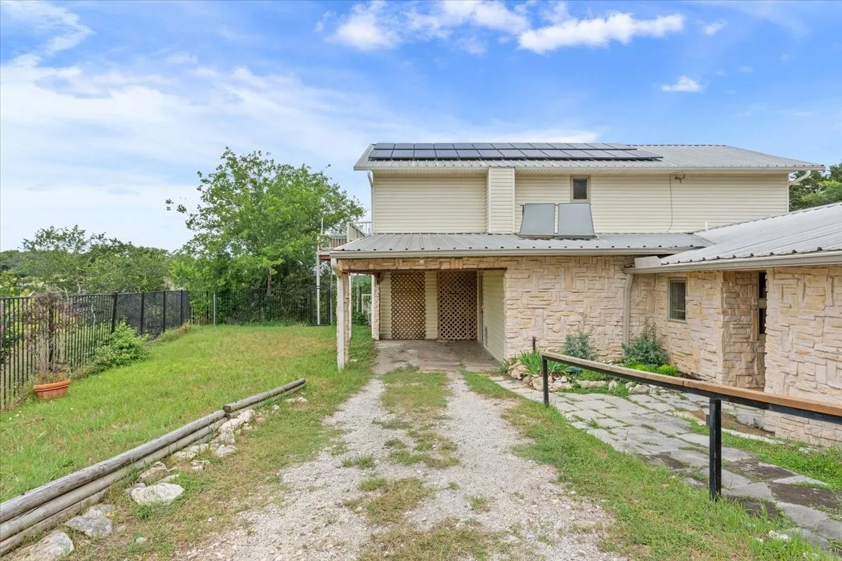 Solar powered gated entry, yard, covered carport