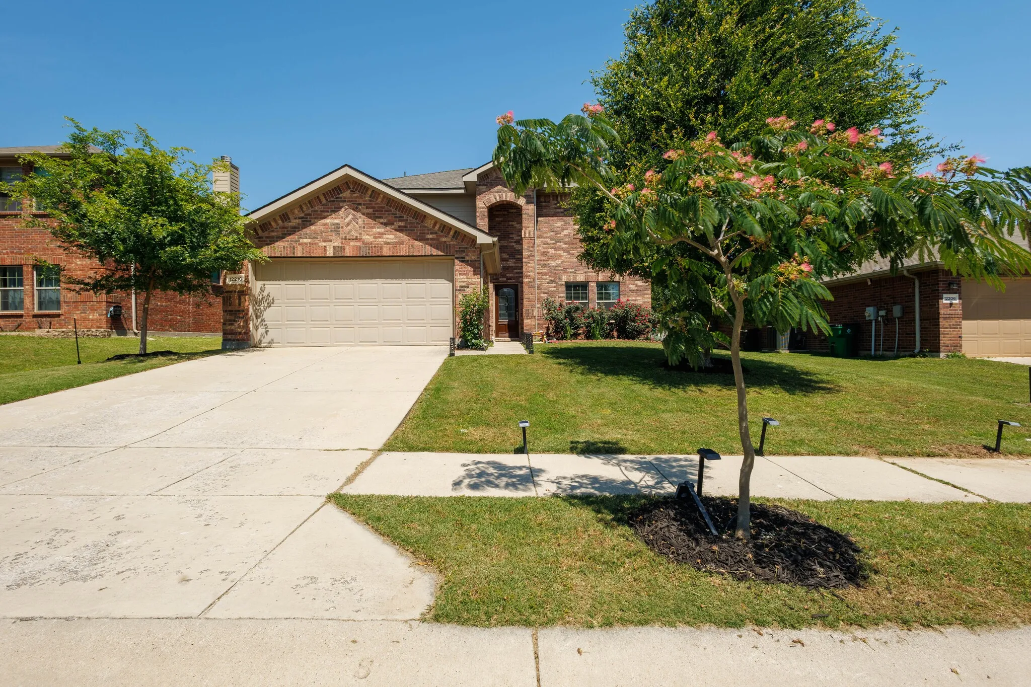 Brick exterior featuring a gabled roofline