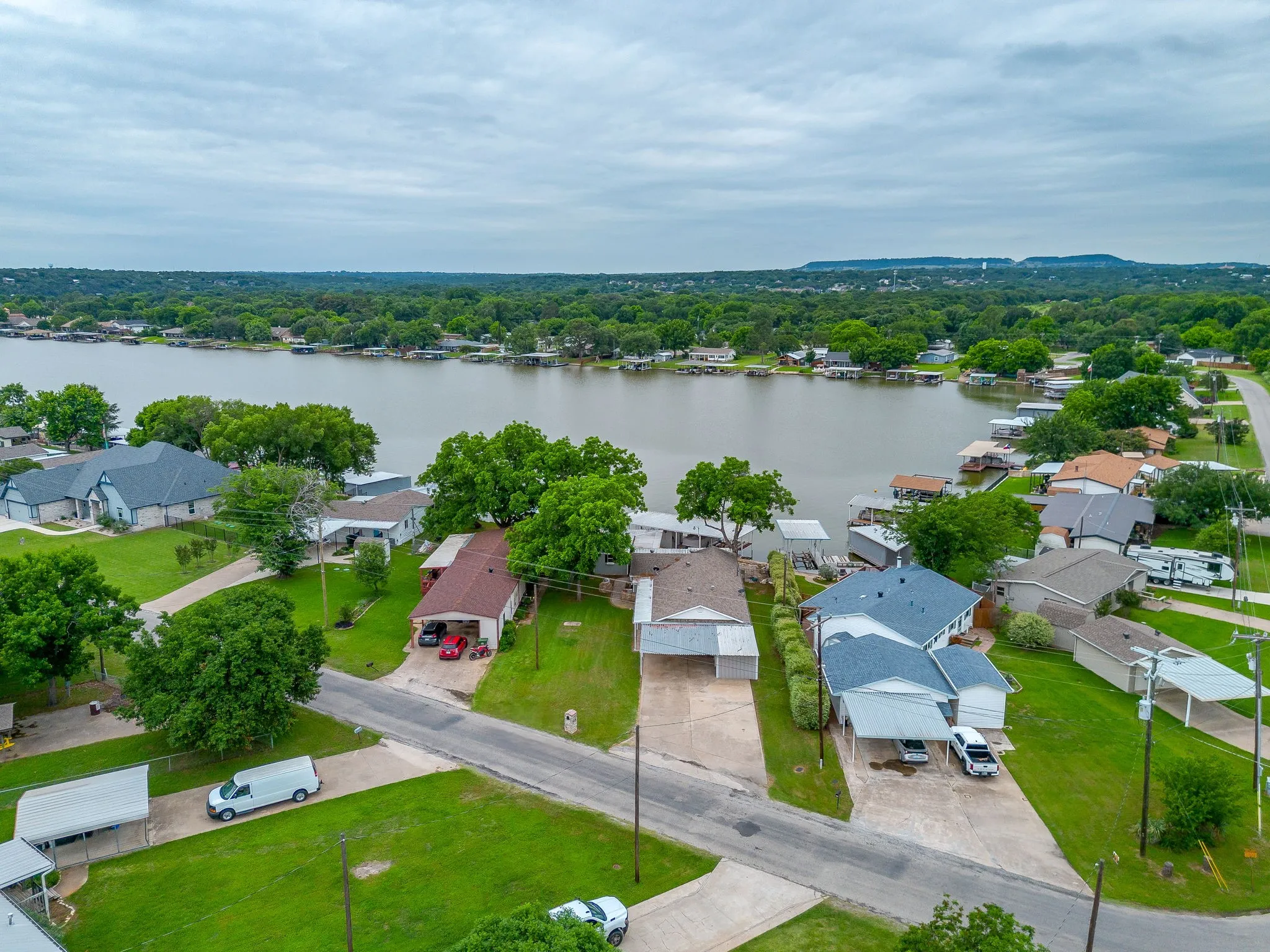 Waterfront properties featuring private boat docks and covered parking
