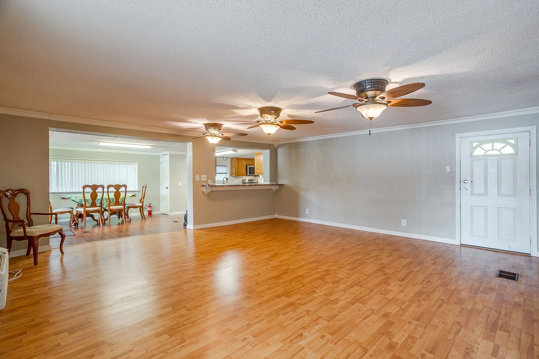 Spacious interior featuring wood-finish flooring throughout