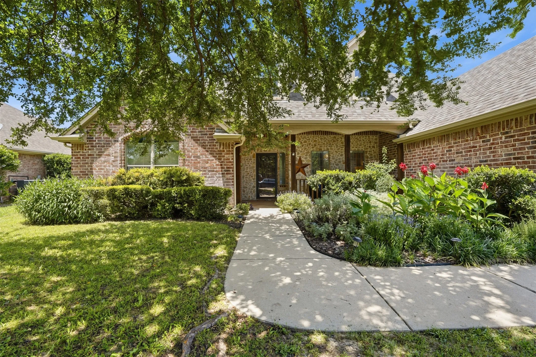 You need to come see this beautiful drought resistant landscaped yard!