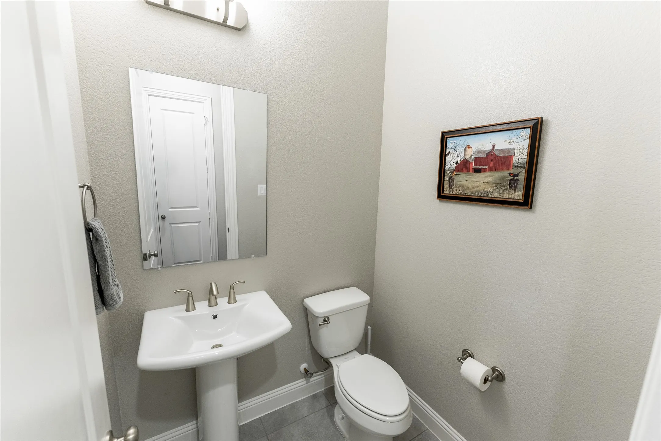 Half bathroom located downstairs.