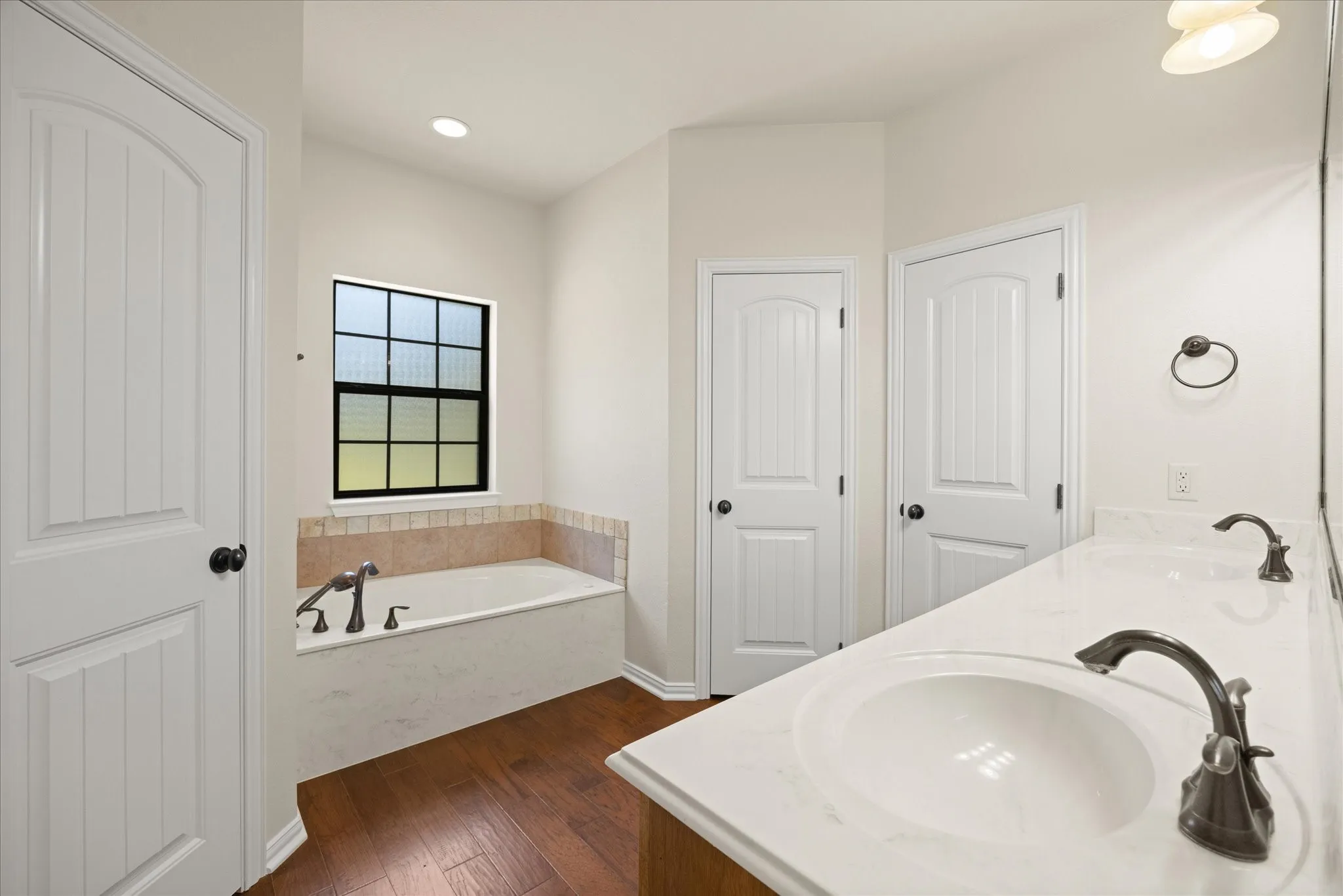 Separate tub and shower with duel sinks
