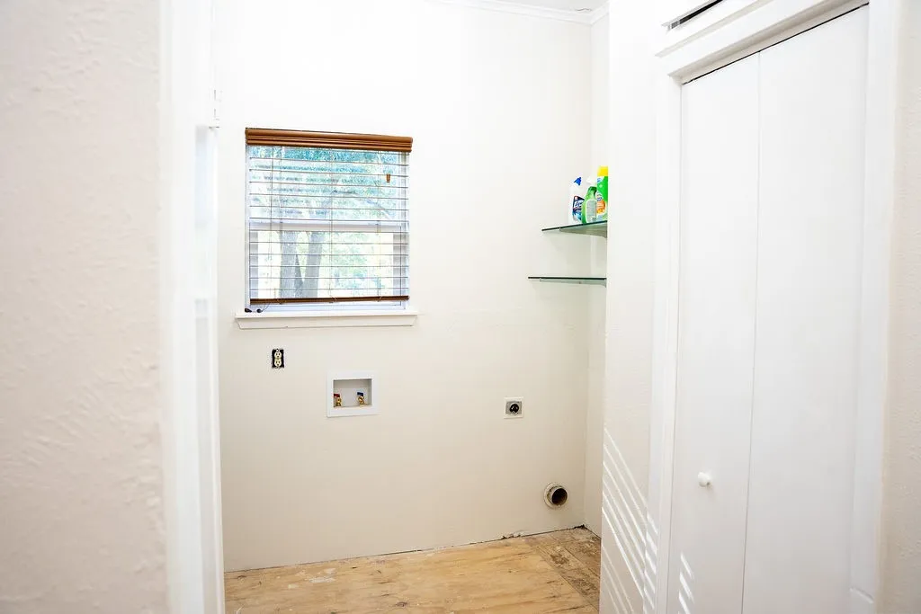 Laundry is right off back entry and also acts as a mudroom.