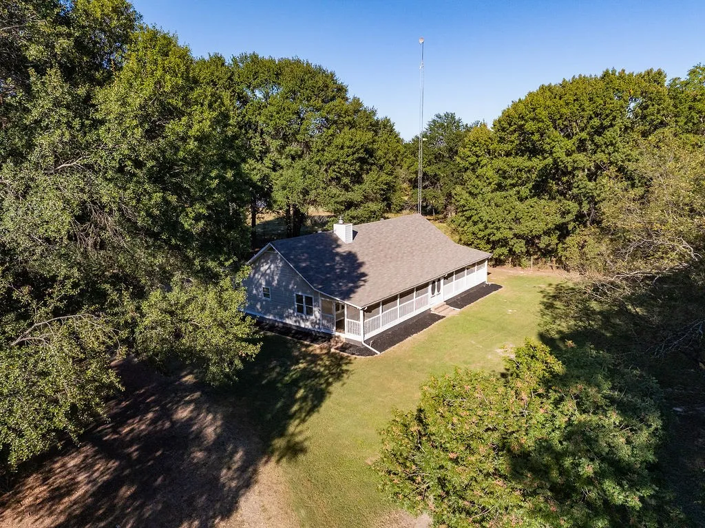 Home is nestled on 22 acres.