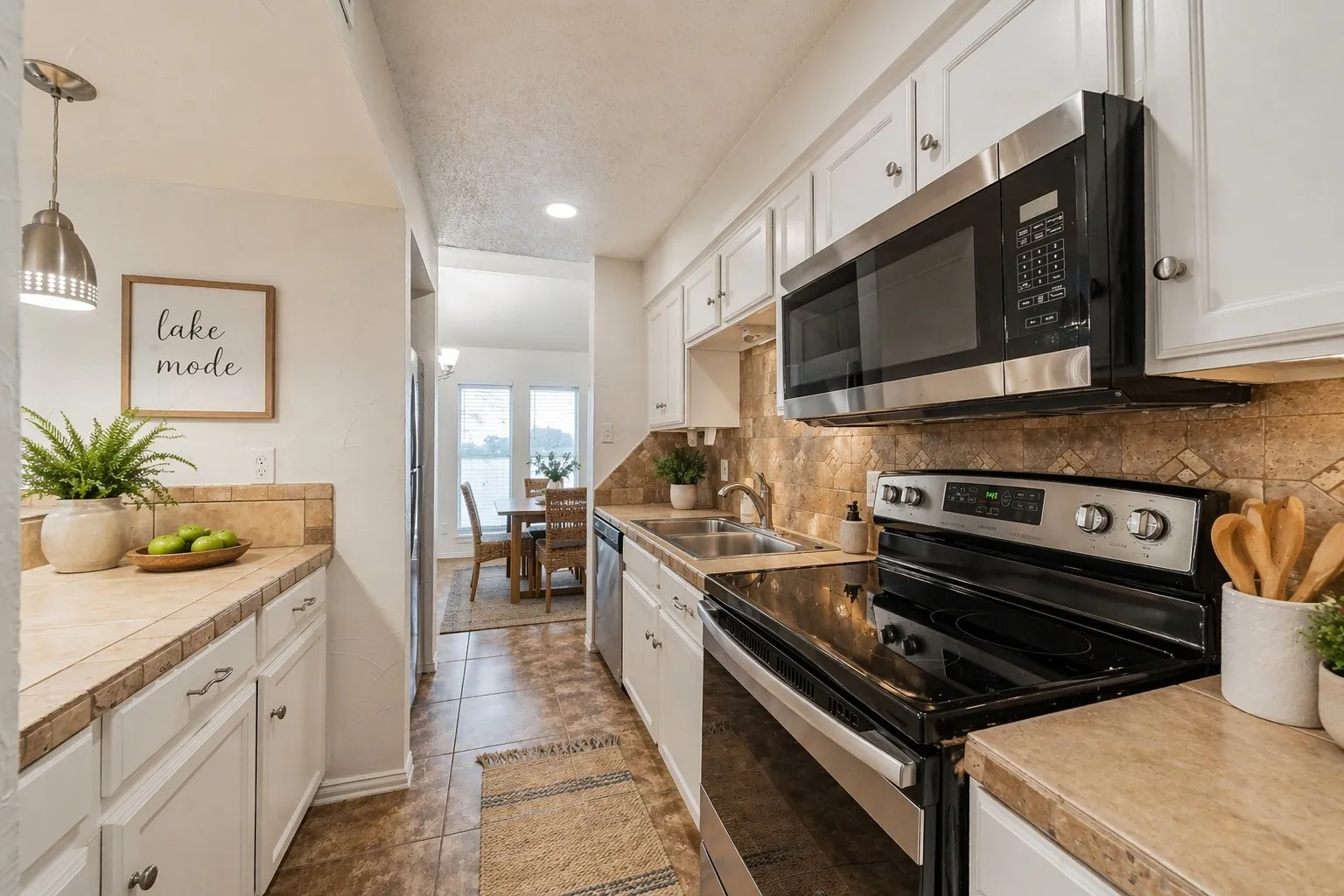 Kitchen open to living room and dining room.