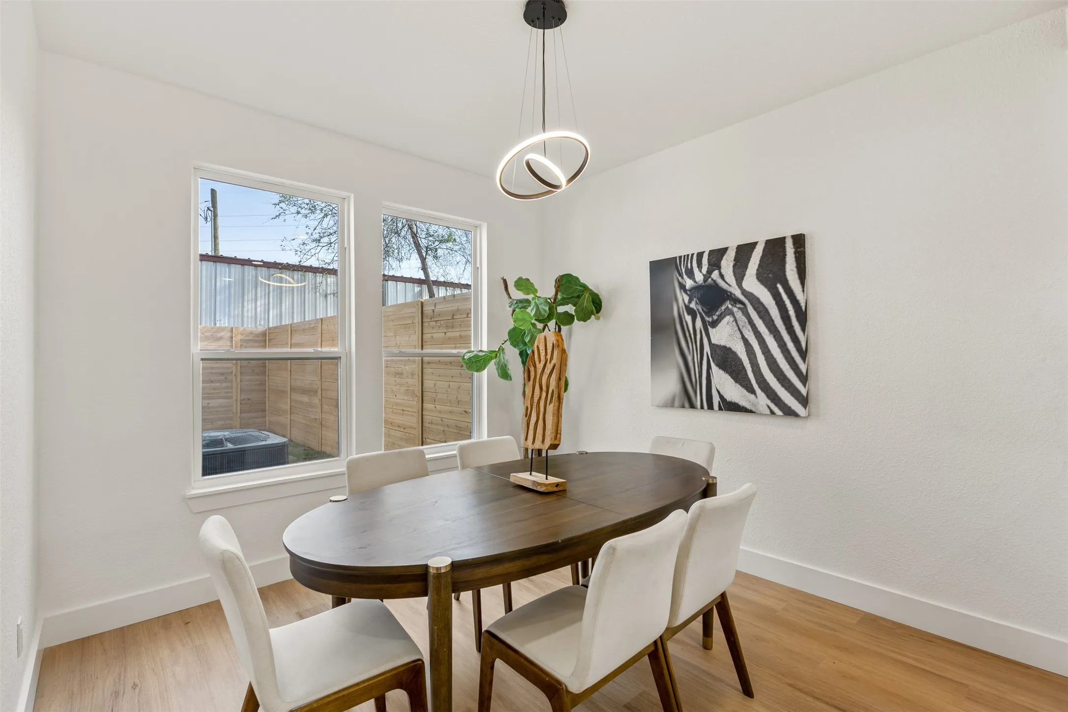 Dining space with light wood finished floors