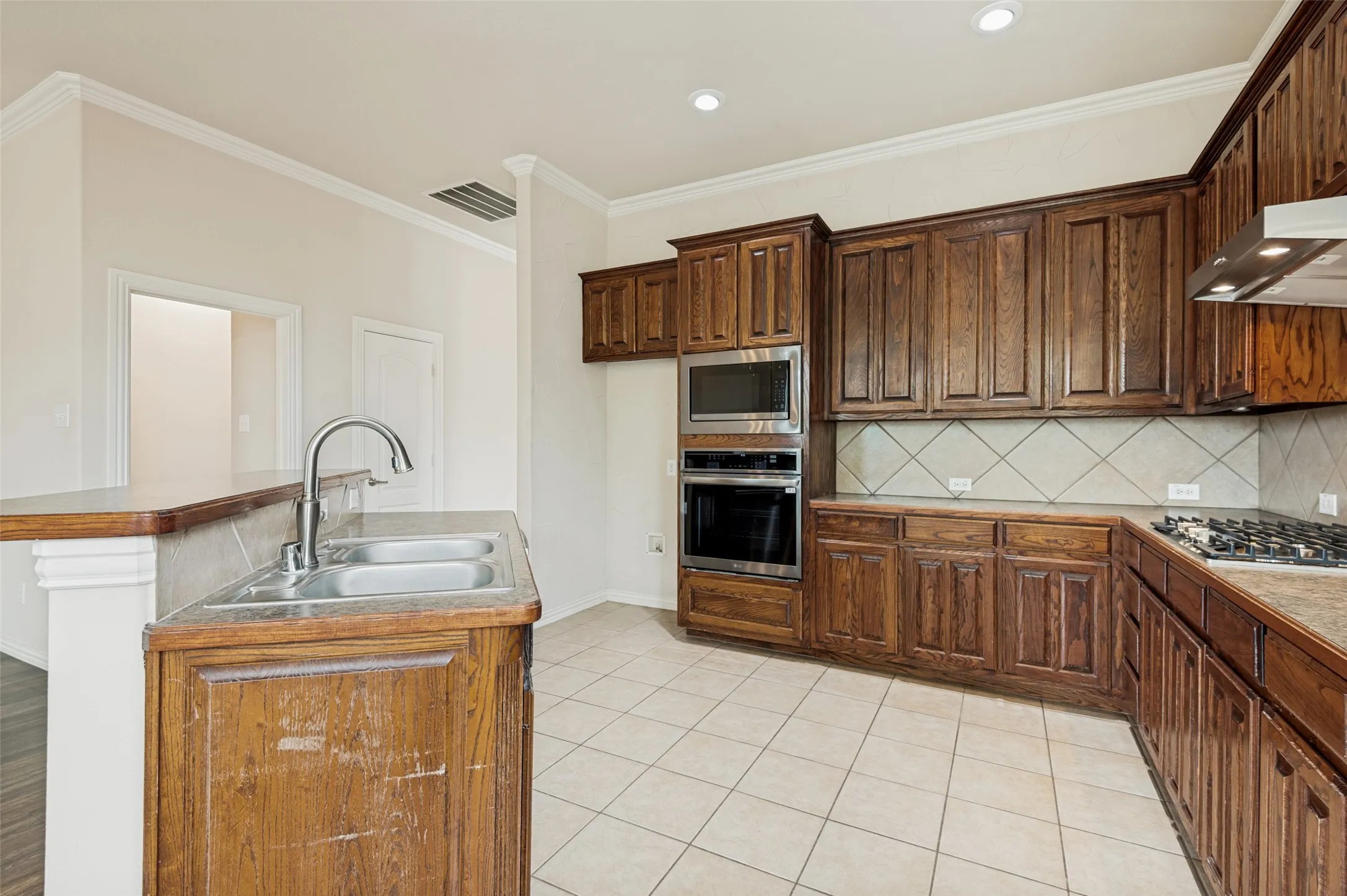 Additional eating area at island ads versatility to the kitchen area.
