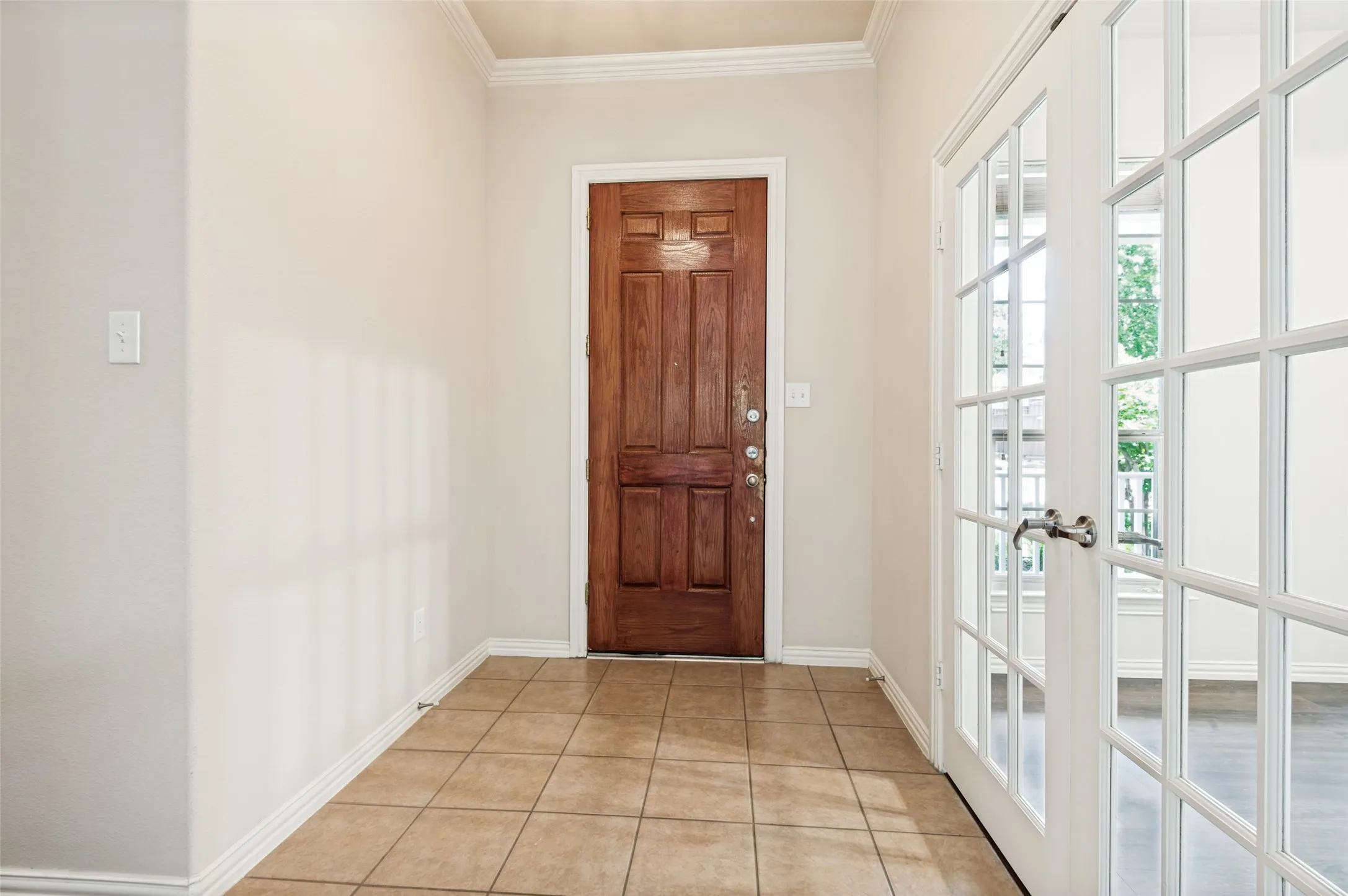 Wide open entry area to greet your guests. French doors lead to the office or use the room as a study or second living area.