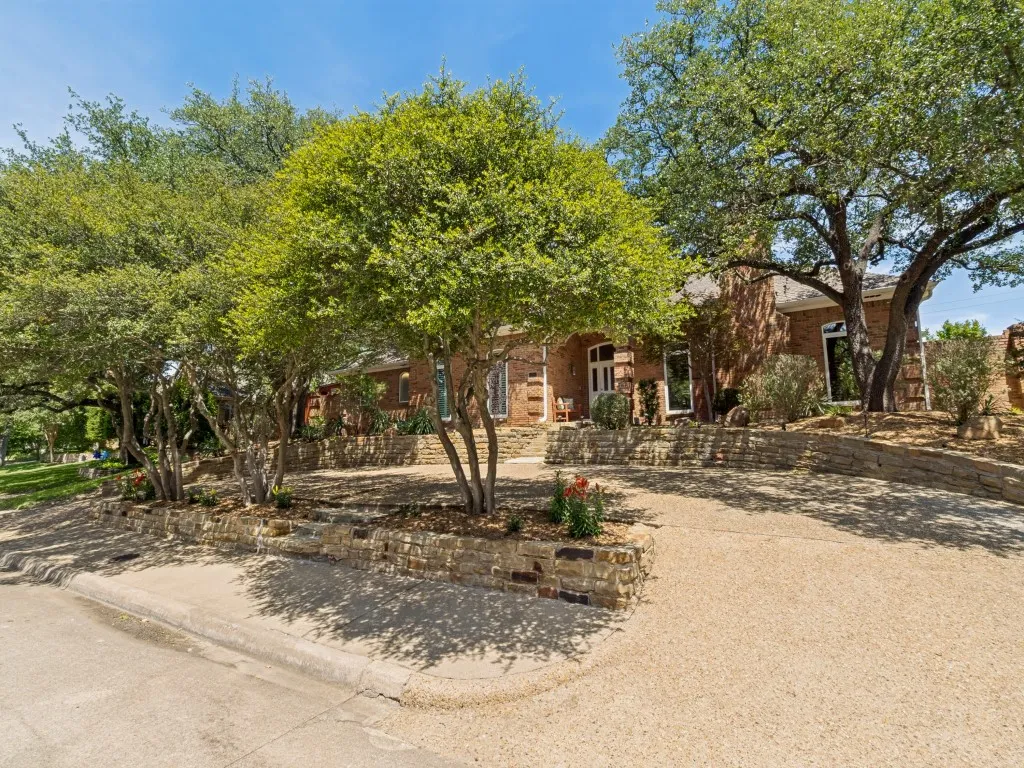 No need for guests to park on the street with the circular driveway!