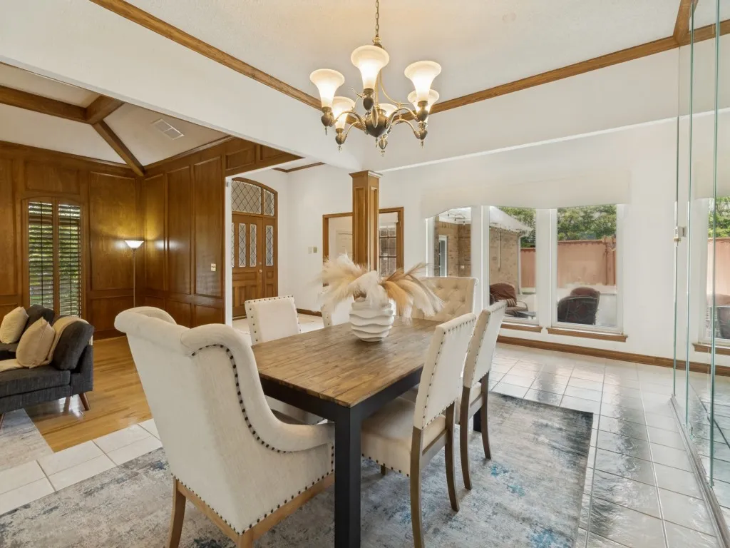 Beautiful views of the back yard and pool create a stunning backdrop for both dining and entertaining!