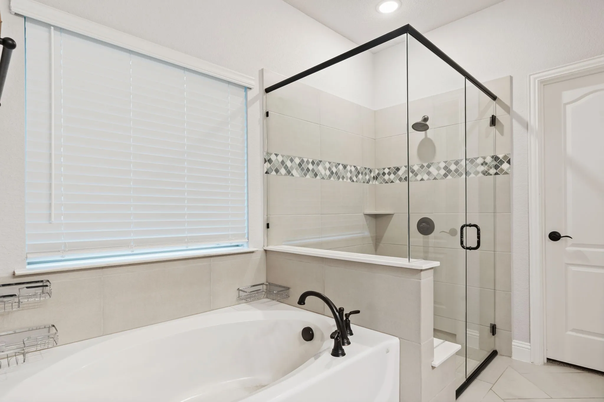 Your Ensuite includes a garden tub, shower with bench and large closet.