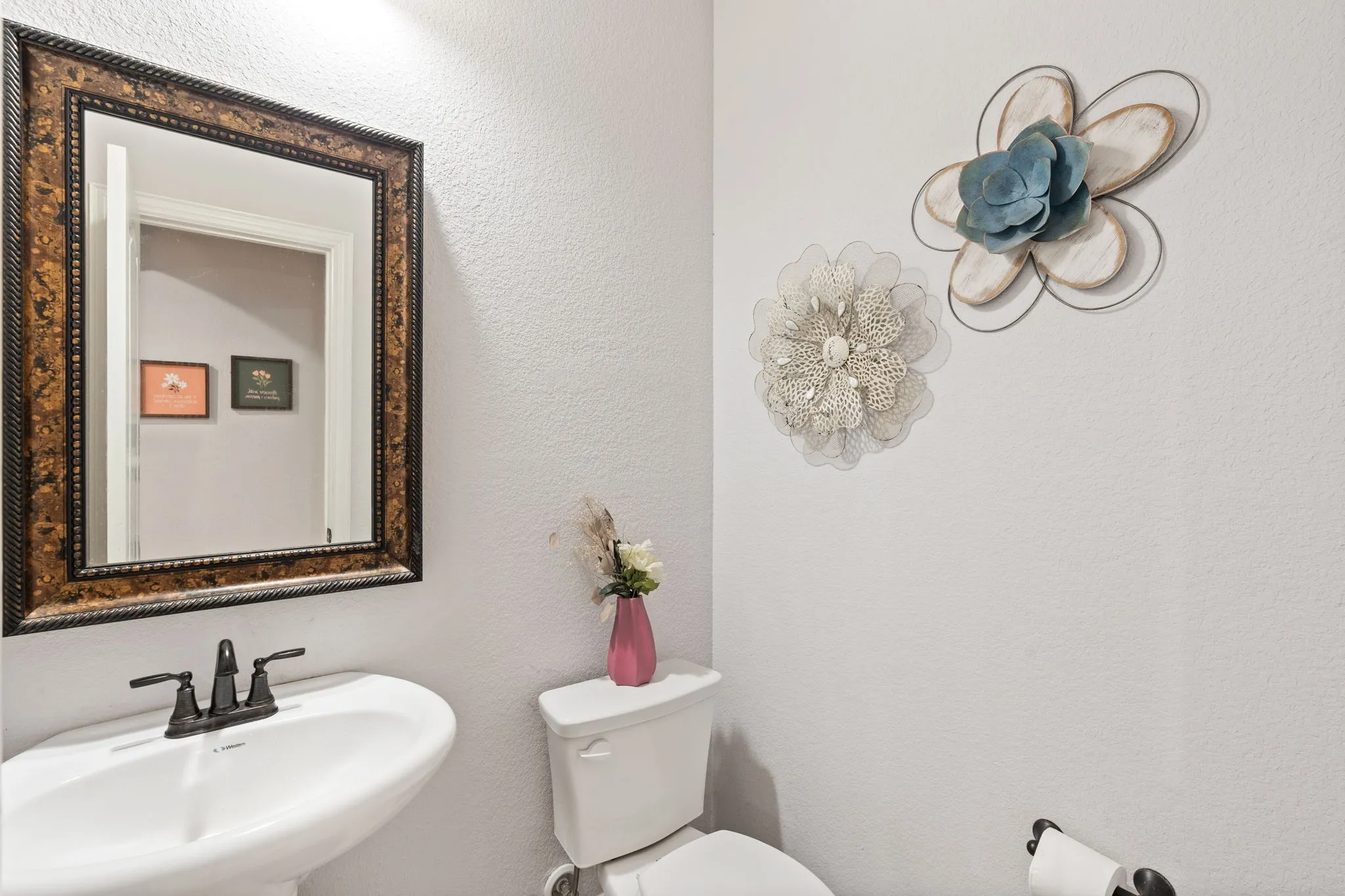 Half Bathroom downstairs perfect for guests
