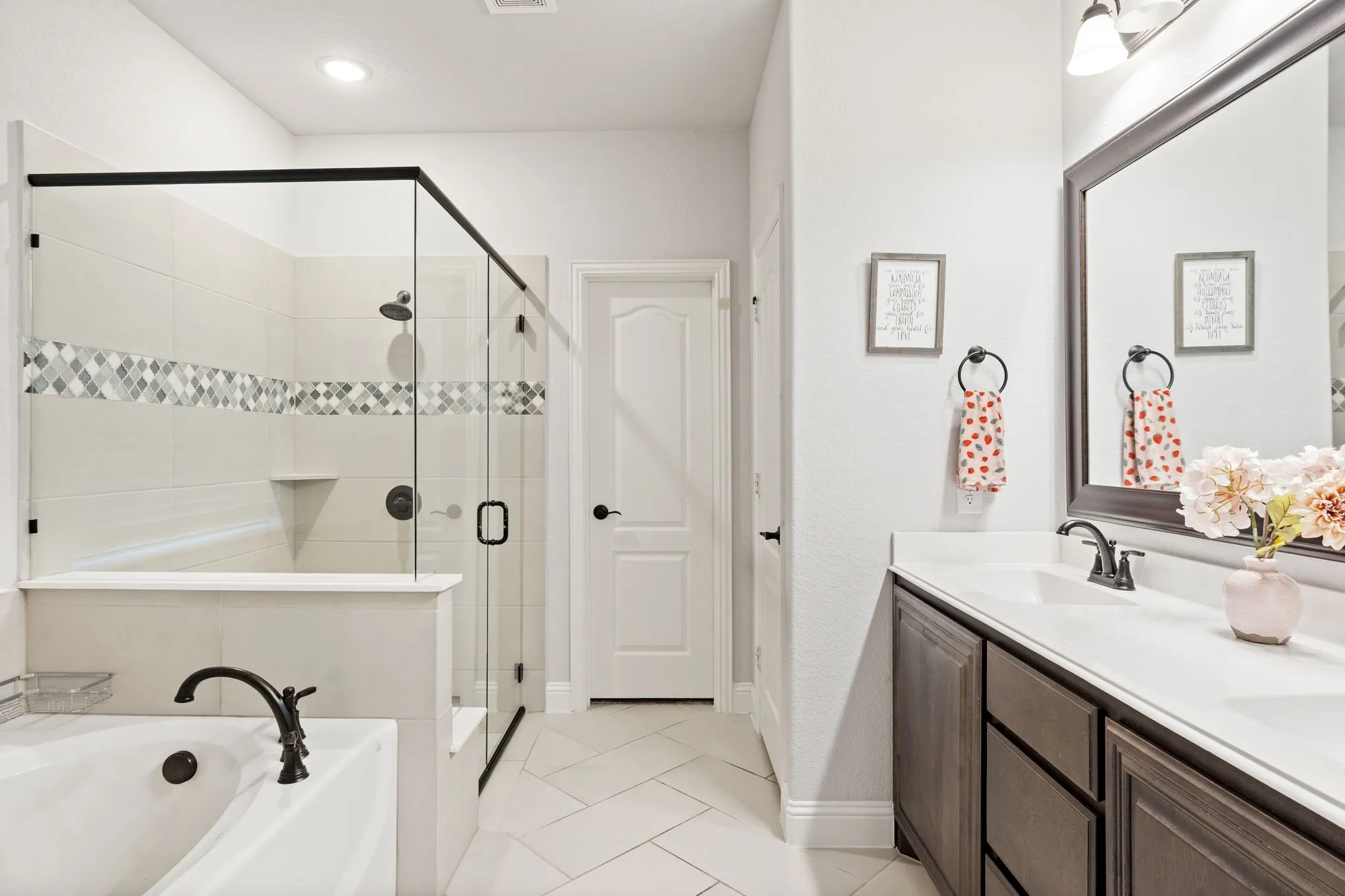 Your Ensuite includes a garden tub, shower with bench and large closet.