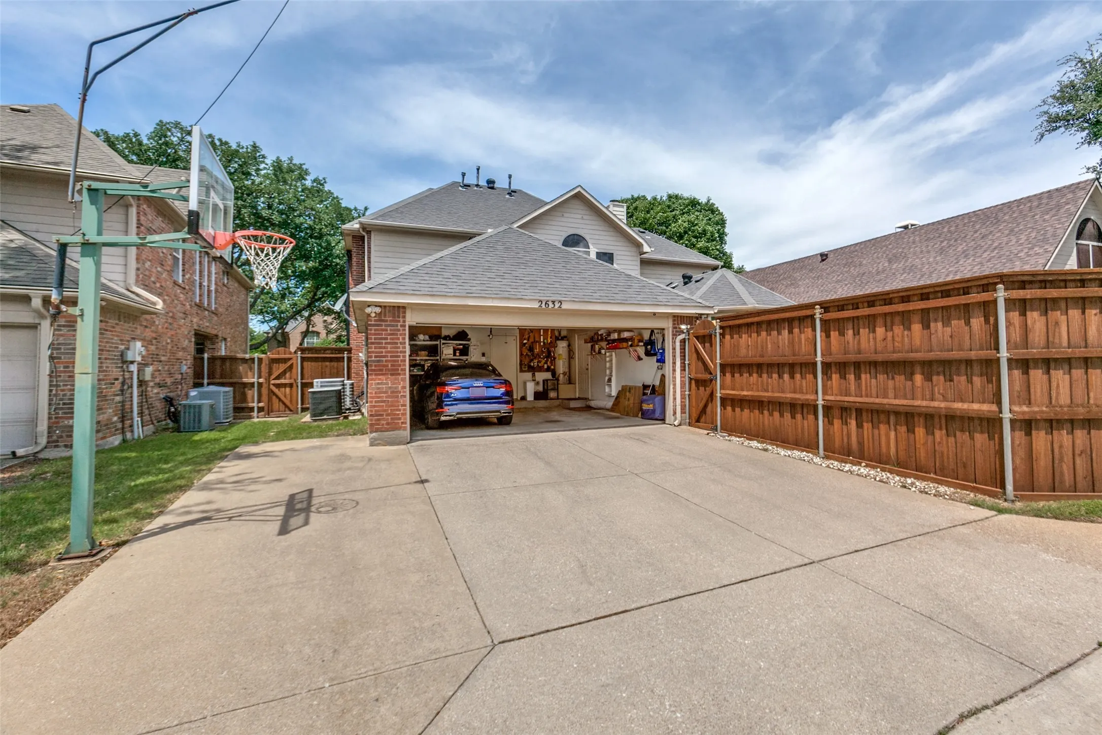 Attached two-car garage and extra parking area