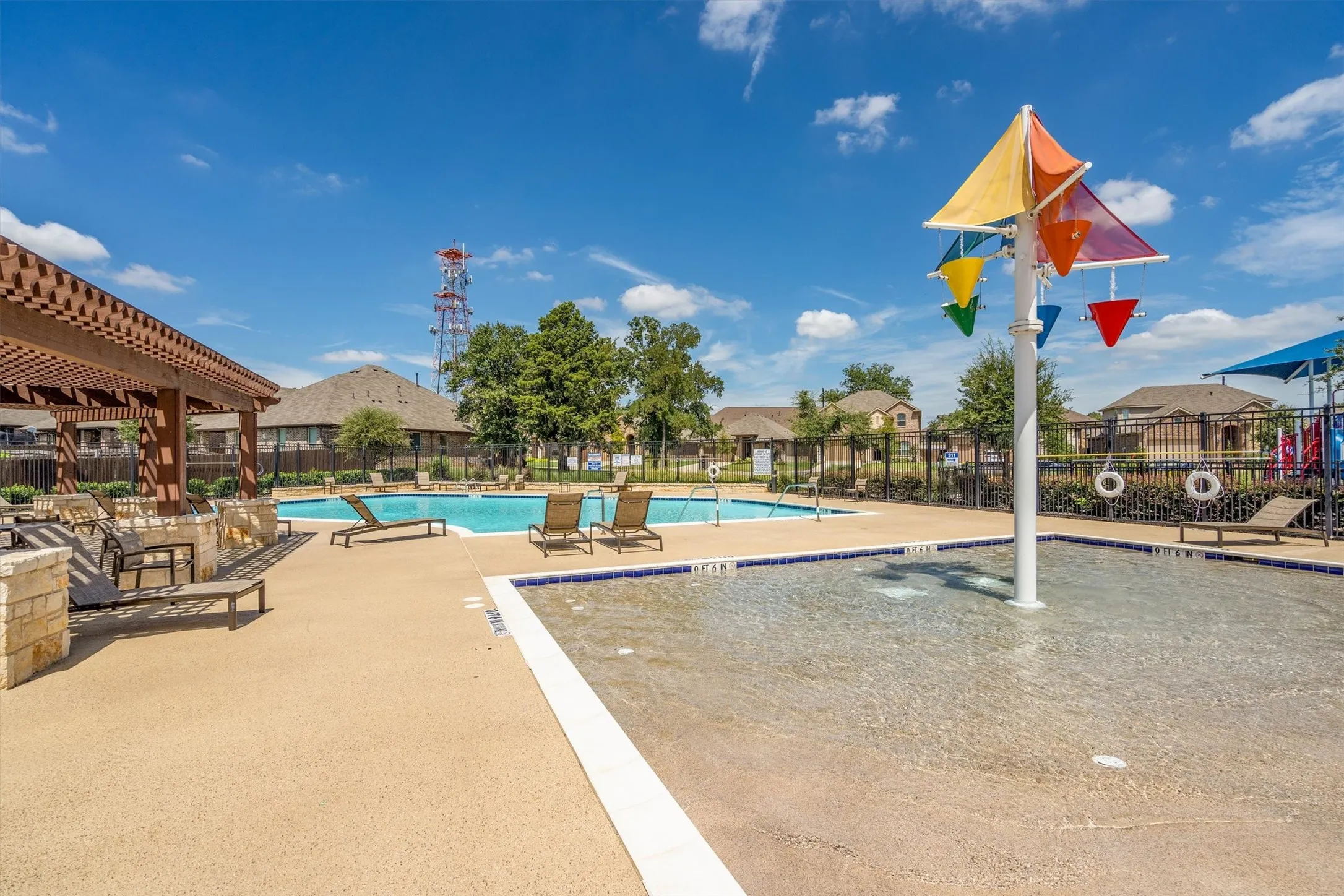 Neighborhood pool with splash pad