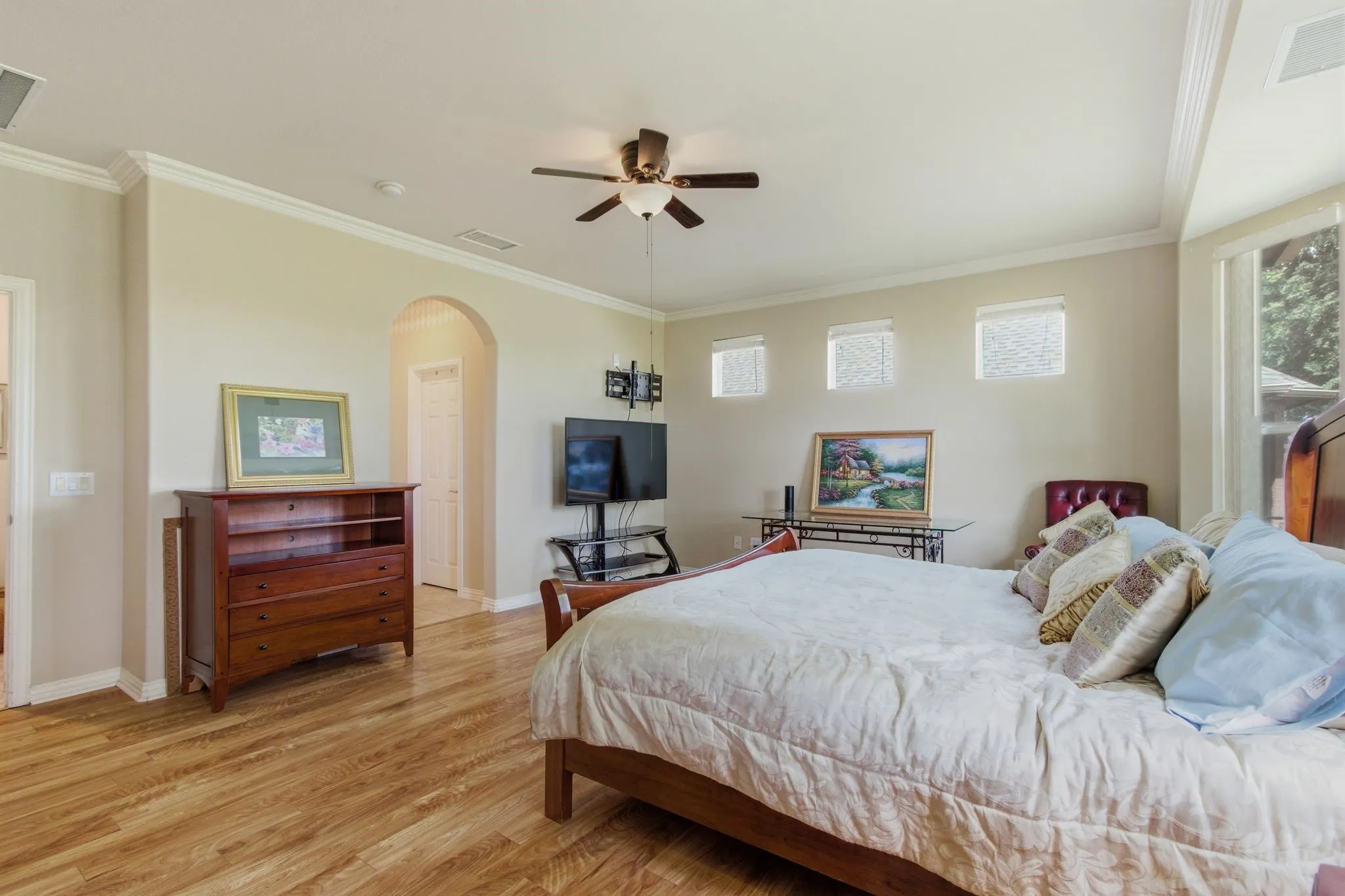 Light and bright, first floor master bedroom with luxury vinyl plank flooring.  Plenty of natural lighting.