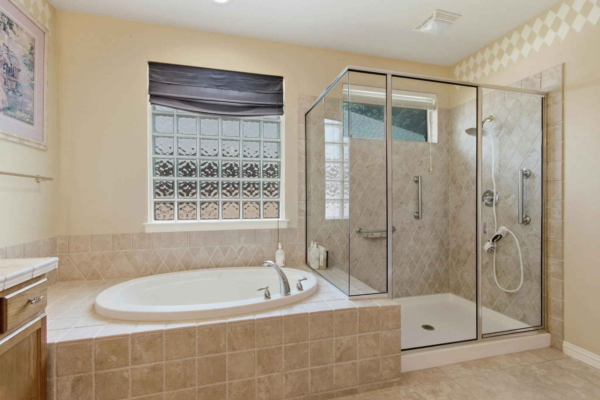 Large master bath with separate  walk sin closets. Wonderful soaking tub, tiled jetted tub and separated shower.