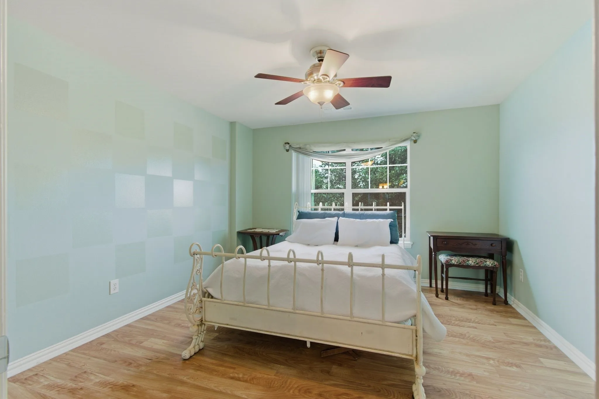2nd floor bedroom with lots of natural light.