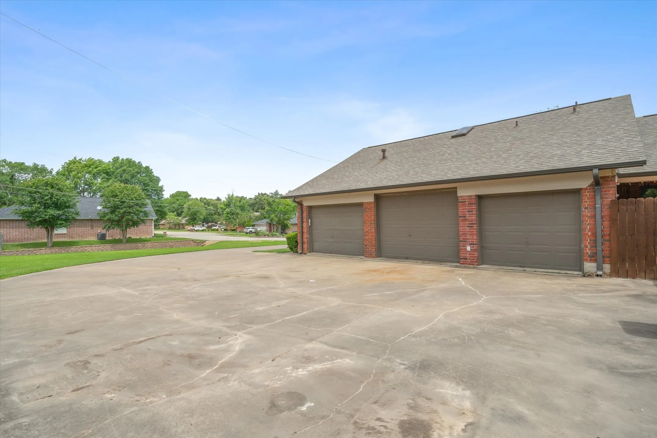 Plenty of parking with rear facing 3 car garage.