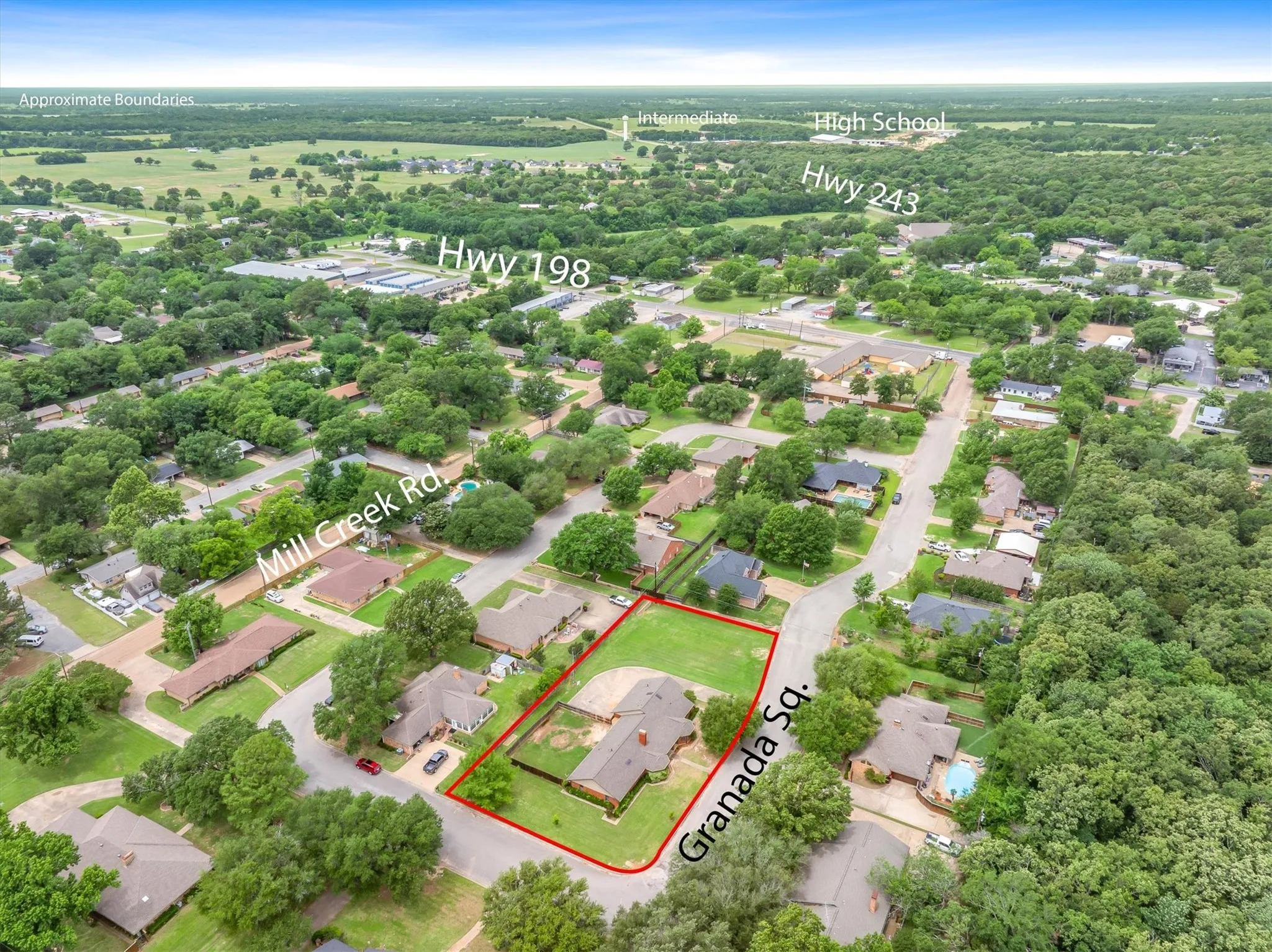 Over 1/2 acre, in the city, near schools and shopping.