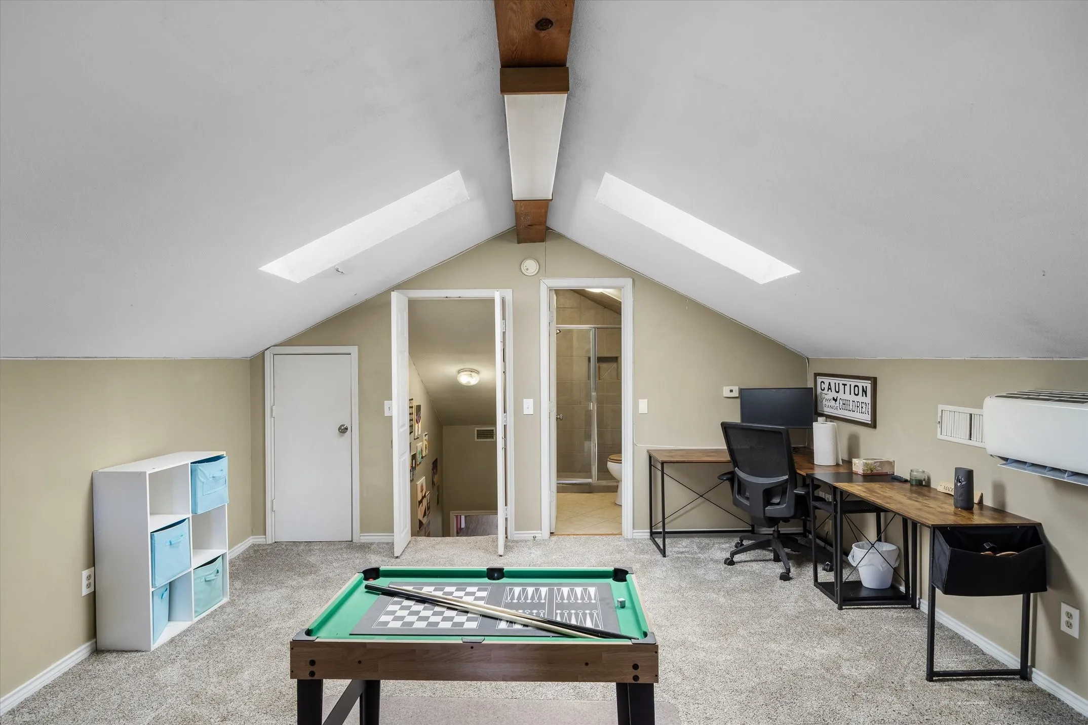 Bonus bedroom, movie/game/family room. Features skylights, storage and bath